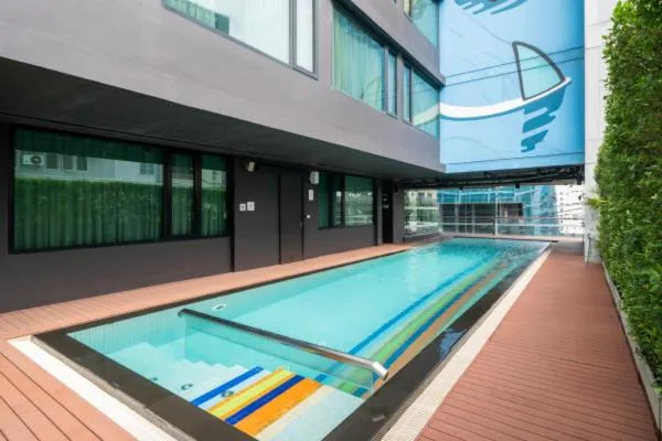 Swimming pool in VIC 3 Bangkok Hotel