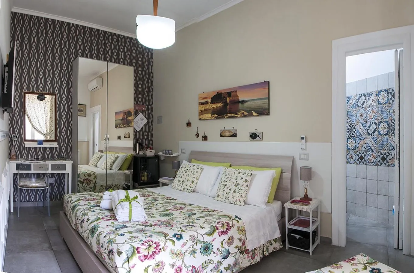 Photo of the whole room, Bed in La Terrazza ai Miracoli