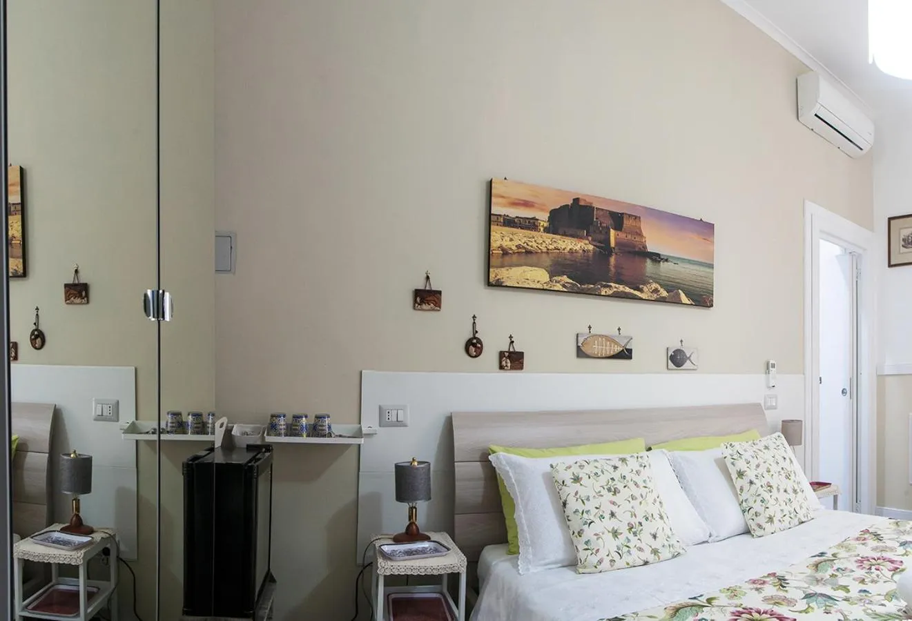 Photo of the whole room, Bed in La Terrazza ai Miracoli