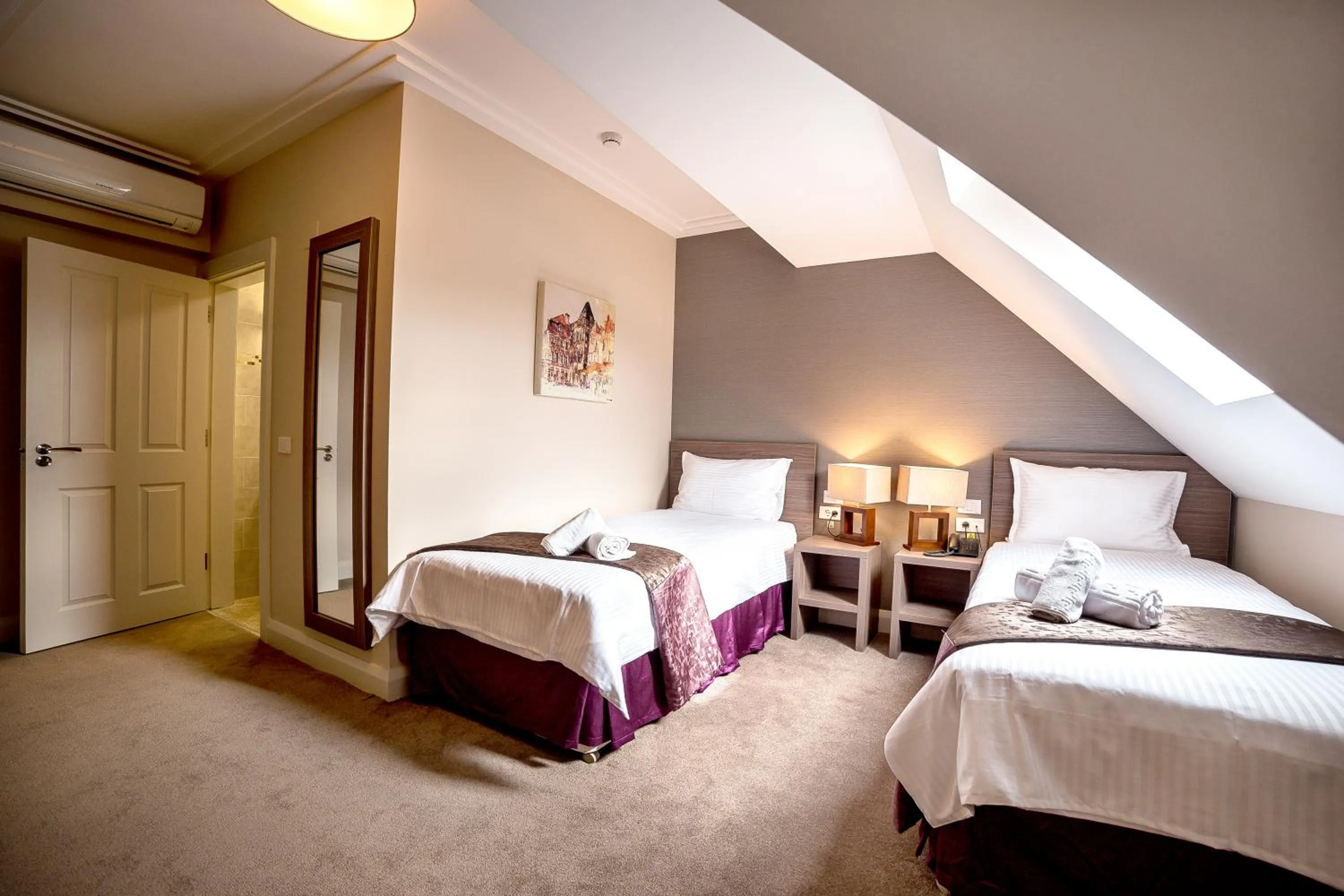 Bed in The Frontier Hotel