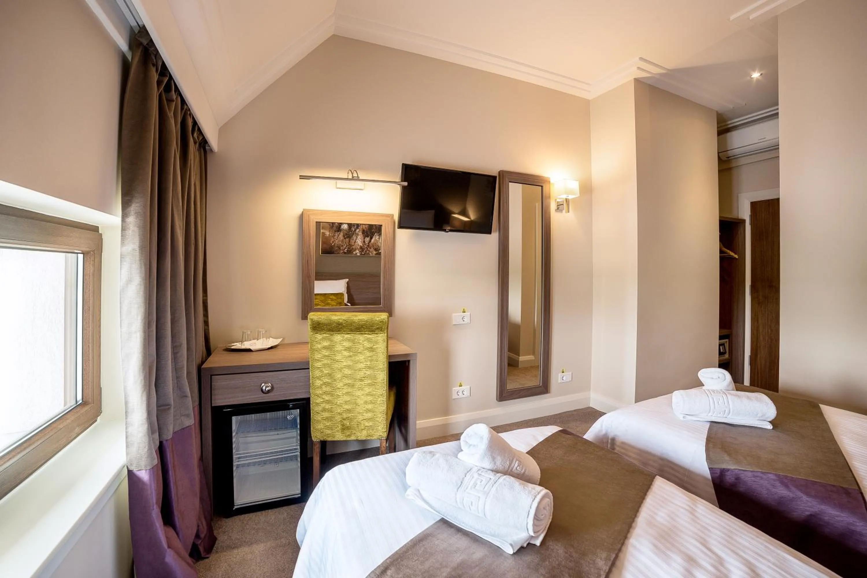 Bed in The Frontier Hotel