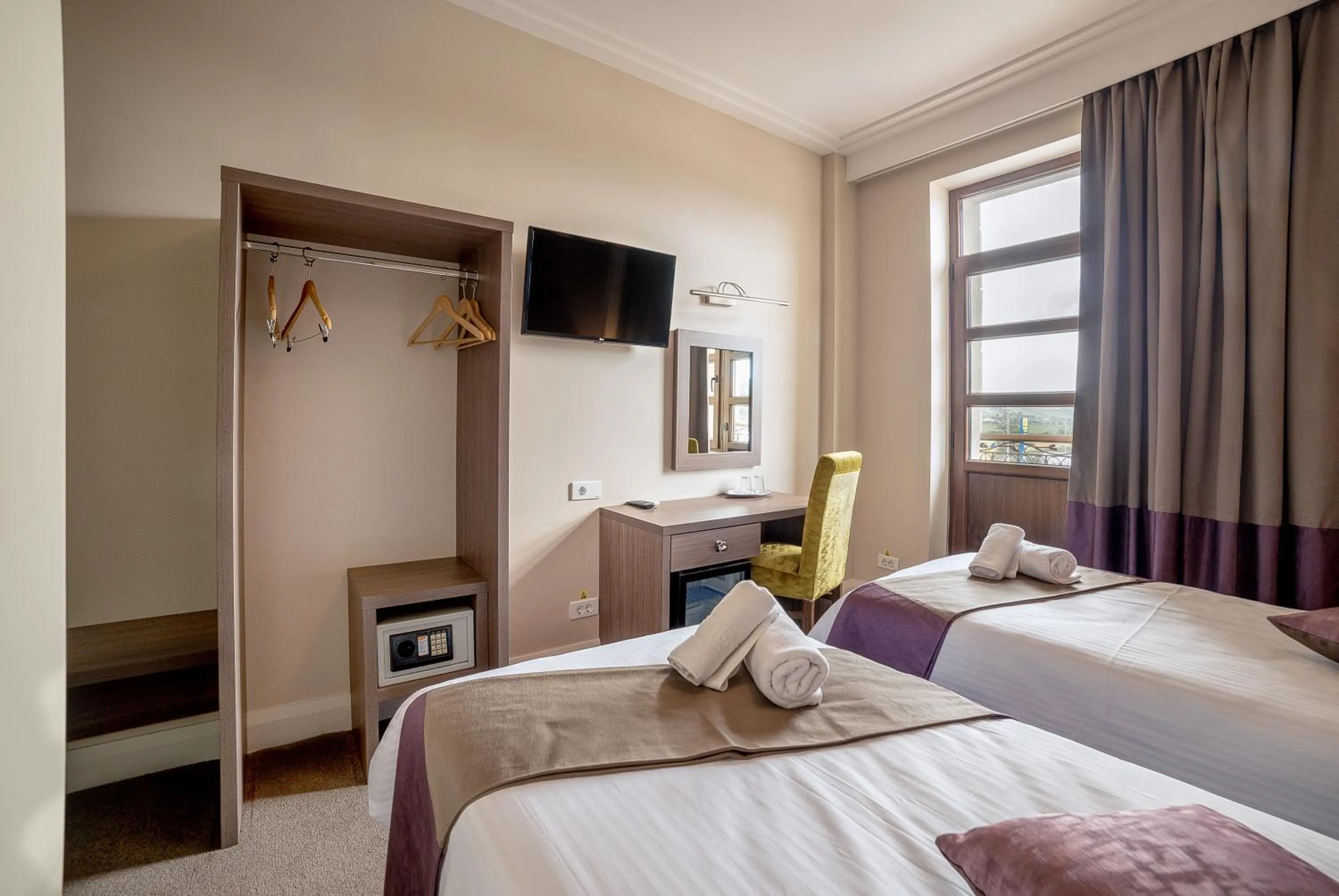 Bed in The Frontier Hotel