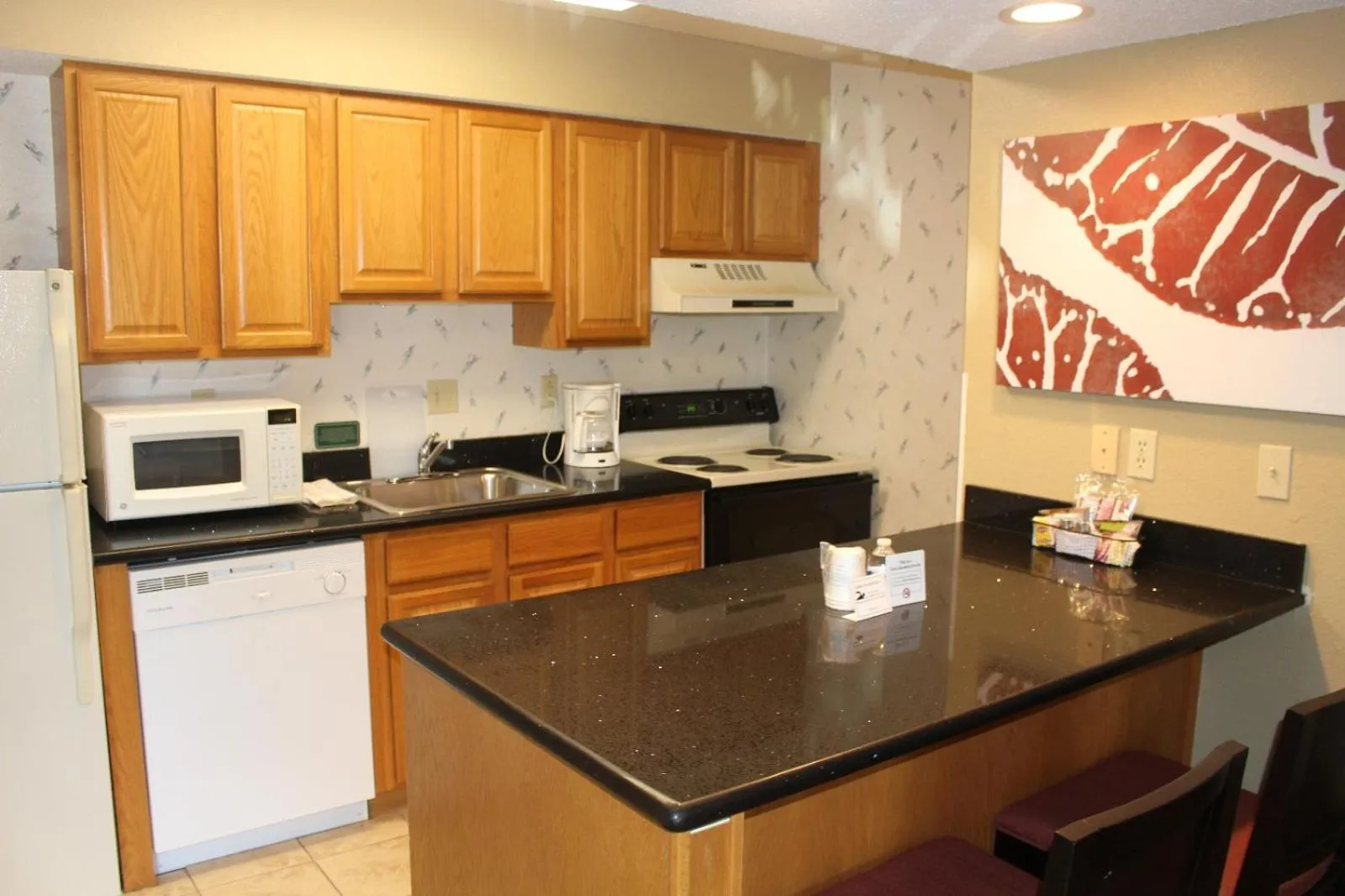 Kitchen or kitchenette in Hawthorn Extended Stay by Wyndham Wichita