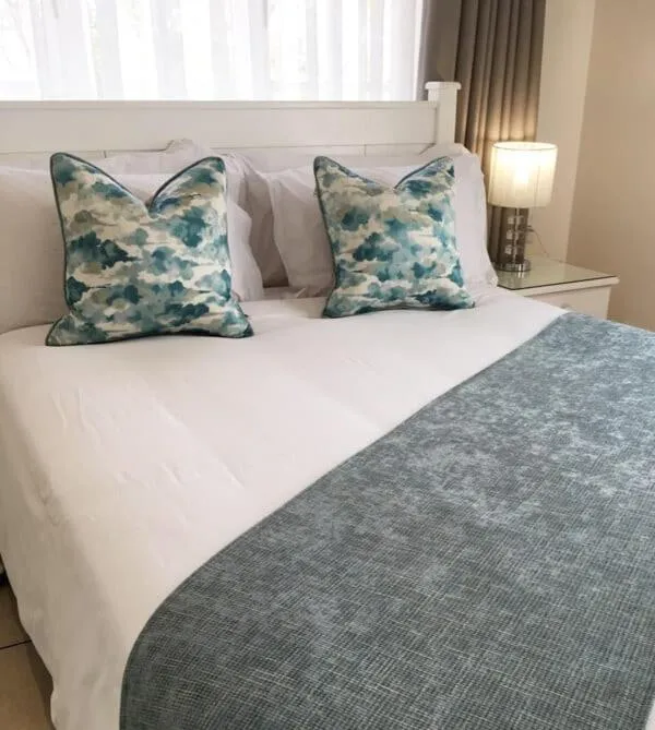 Bed in Peaches & Cream Bed & Breakfast