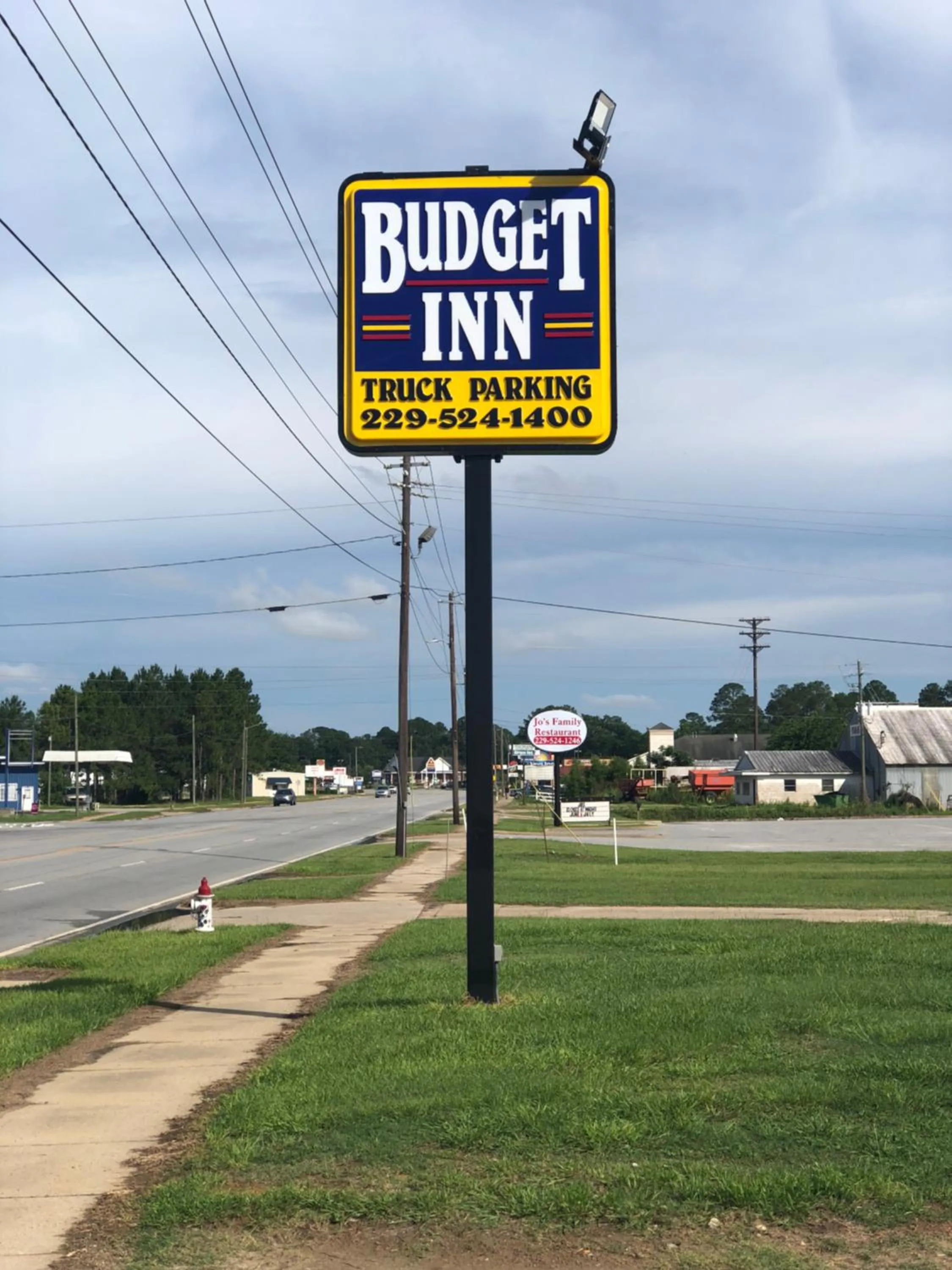 Property logo or sign in Budget Inn