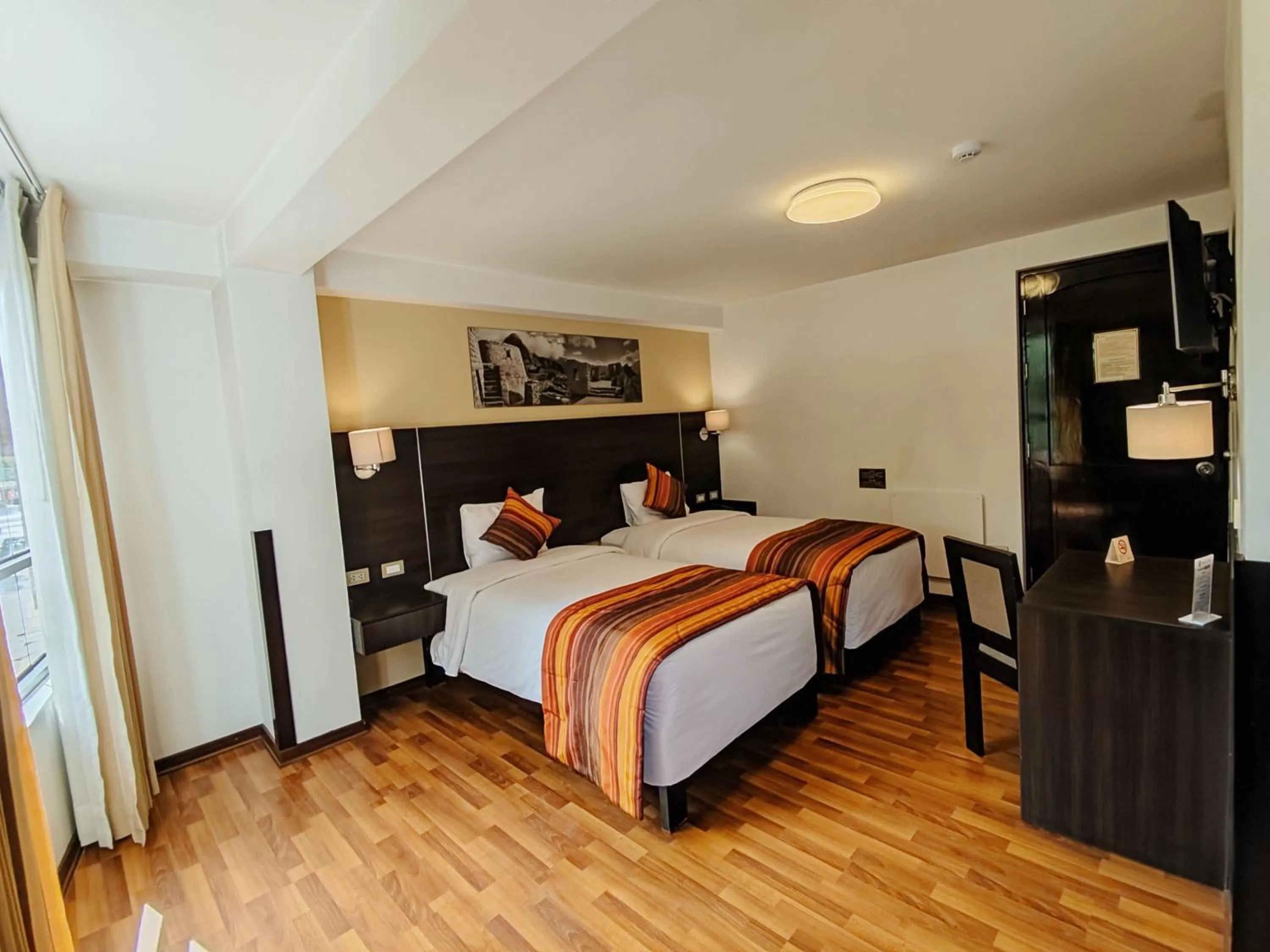 Bed in Royal Inn Cusco Hotel