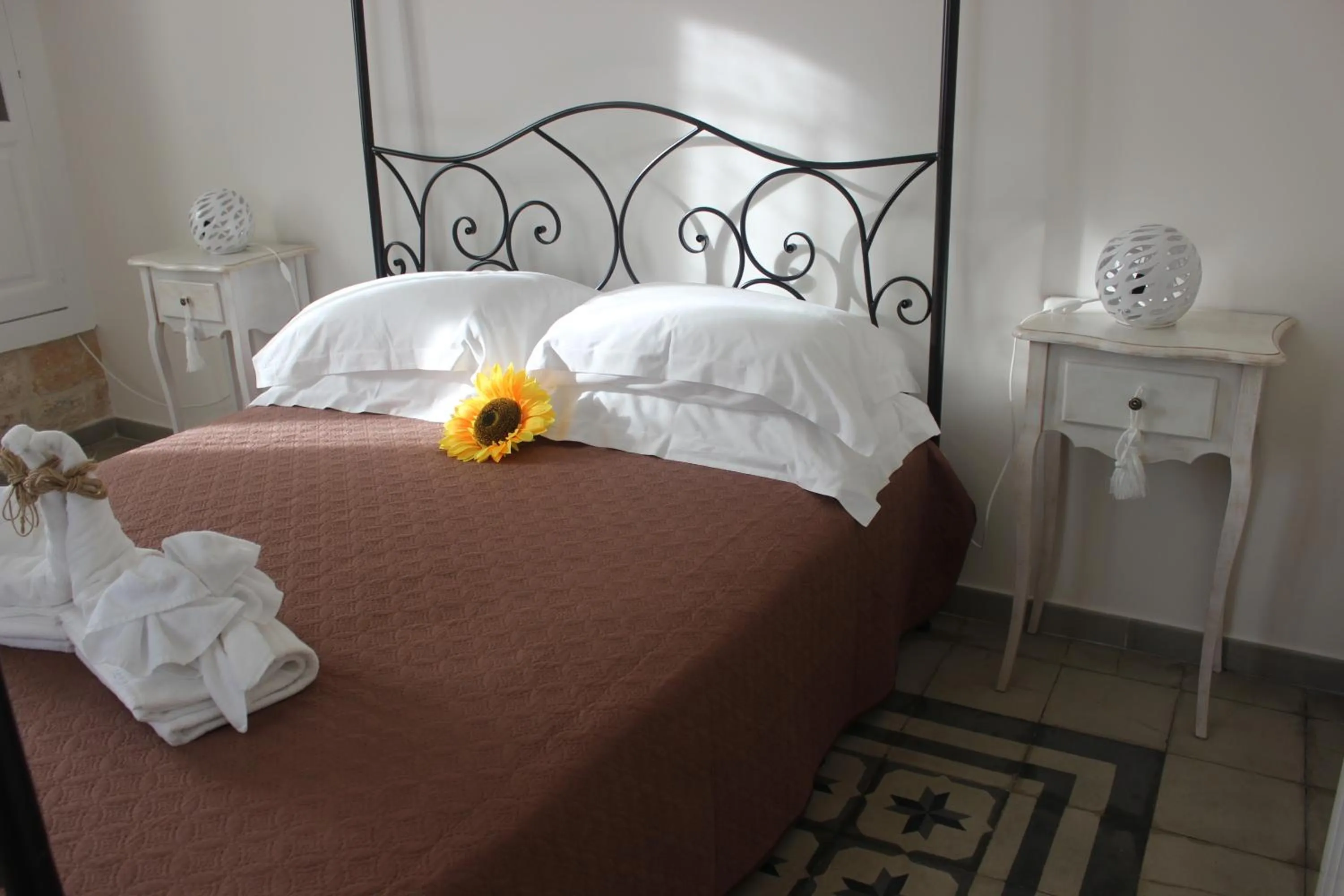 Photo of the whole room, Bed in Dimora Girolamo