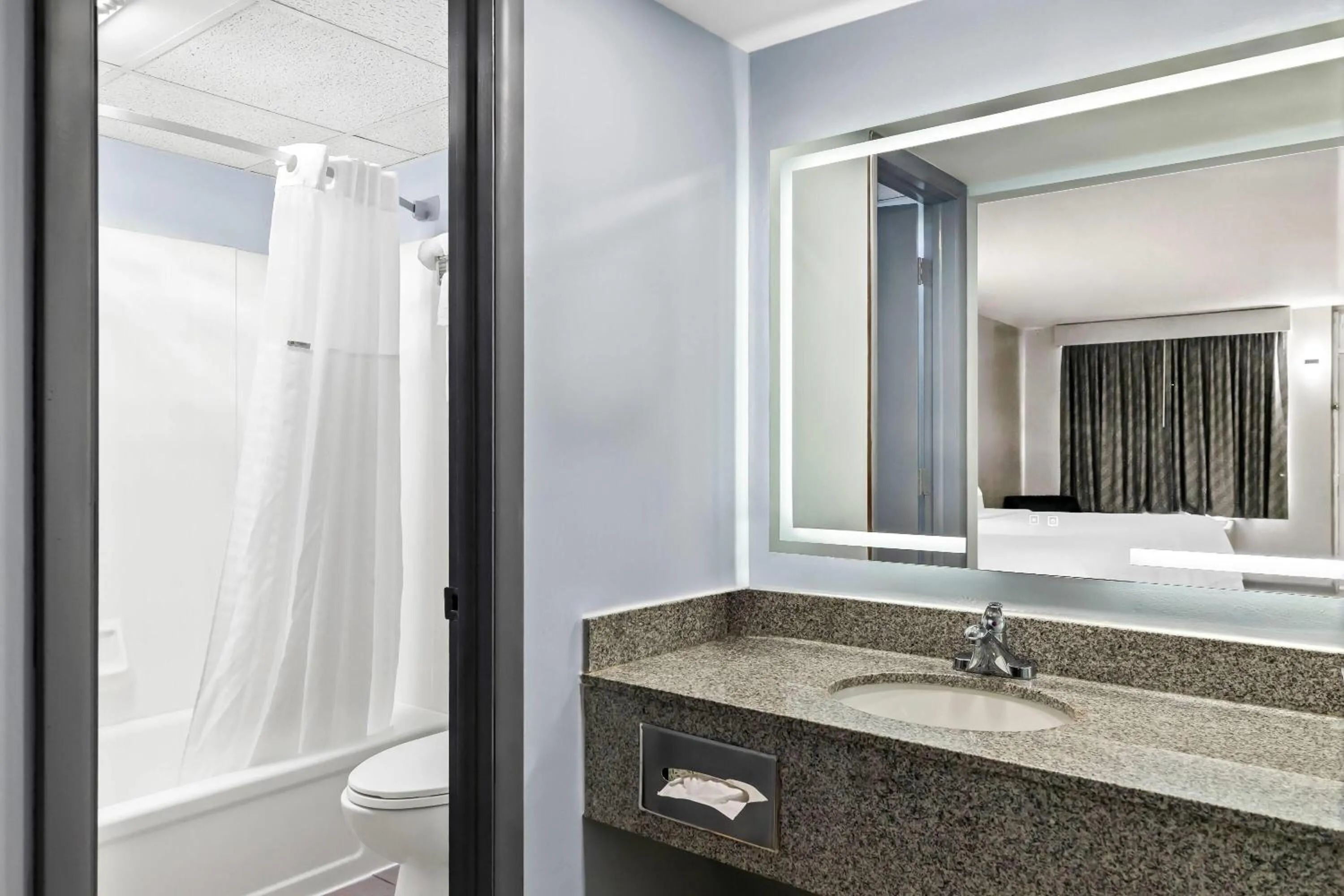 Bathroom in Days Inn by Wyndham Salina South