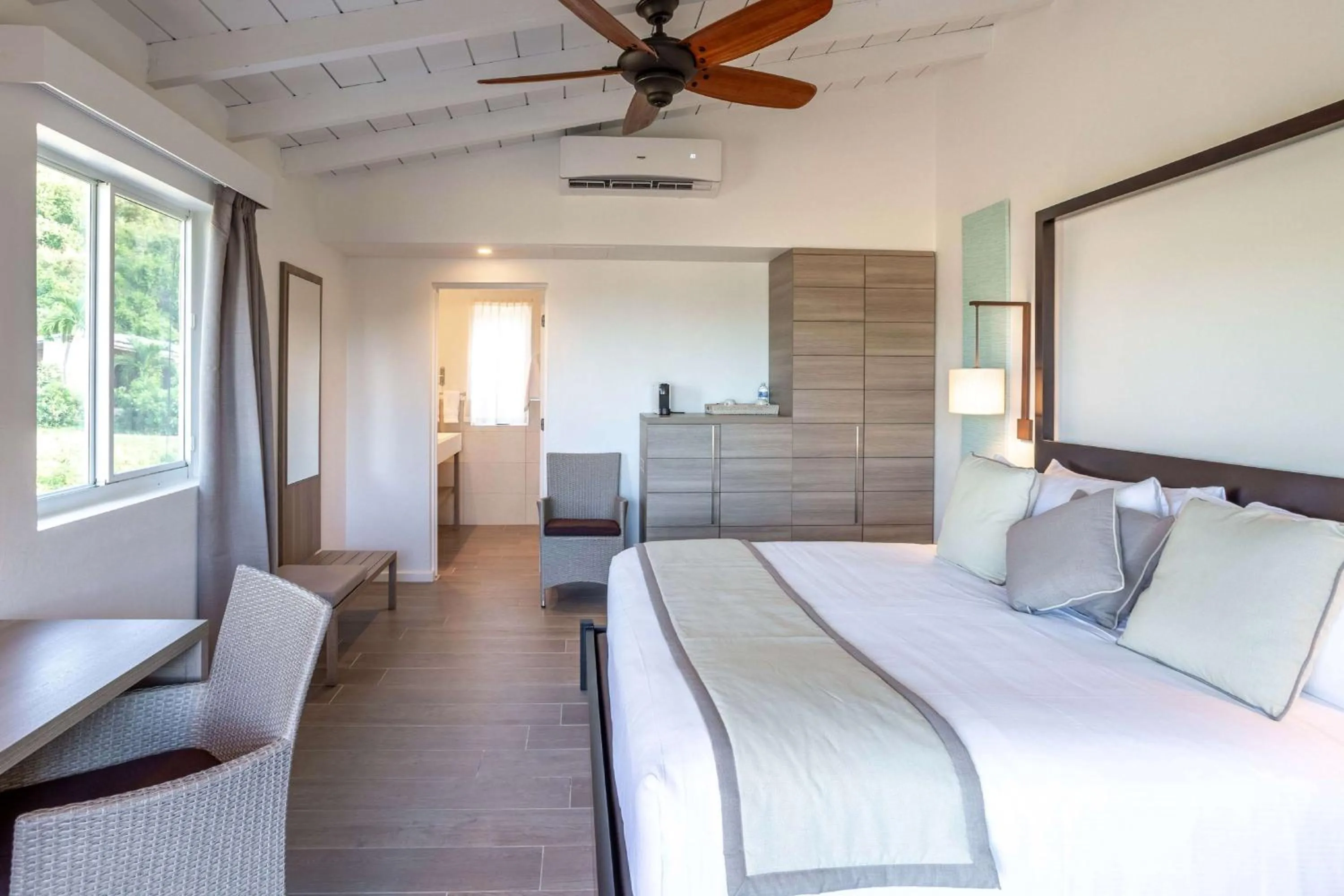 Photo of the whole room, Bed in Wyndham Tortola BVI Lambert Beach Resort