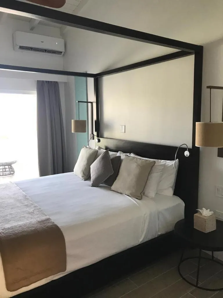 Bed in Wyndham Tortola BVI Lambert Beach Resort