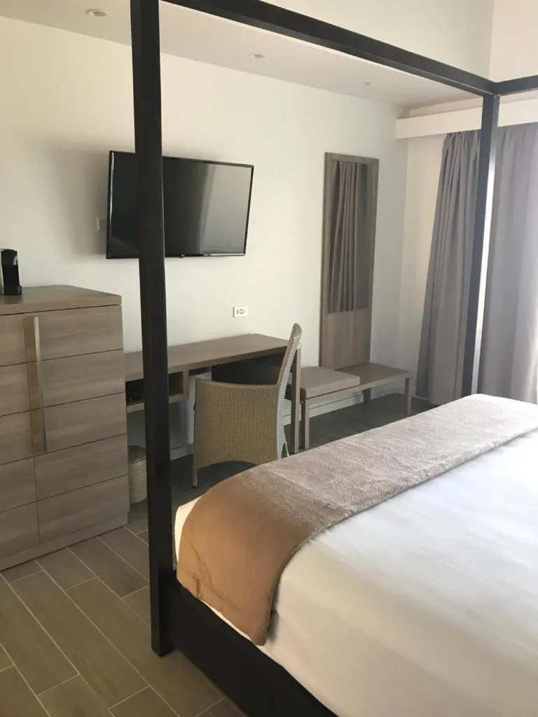 Photo of the whole room, Bed in Wyndham Tortola BVI Lambert Beach Resort