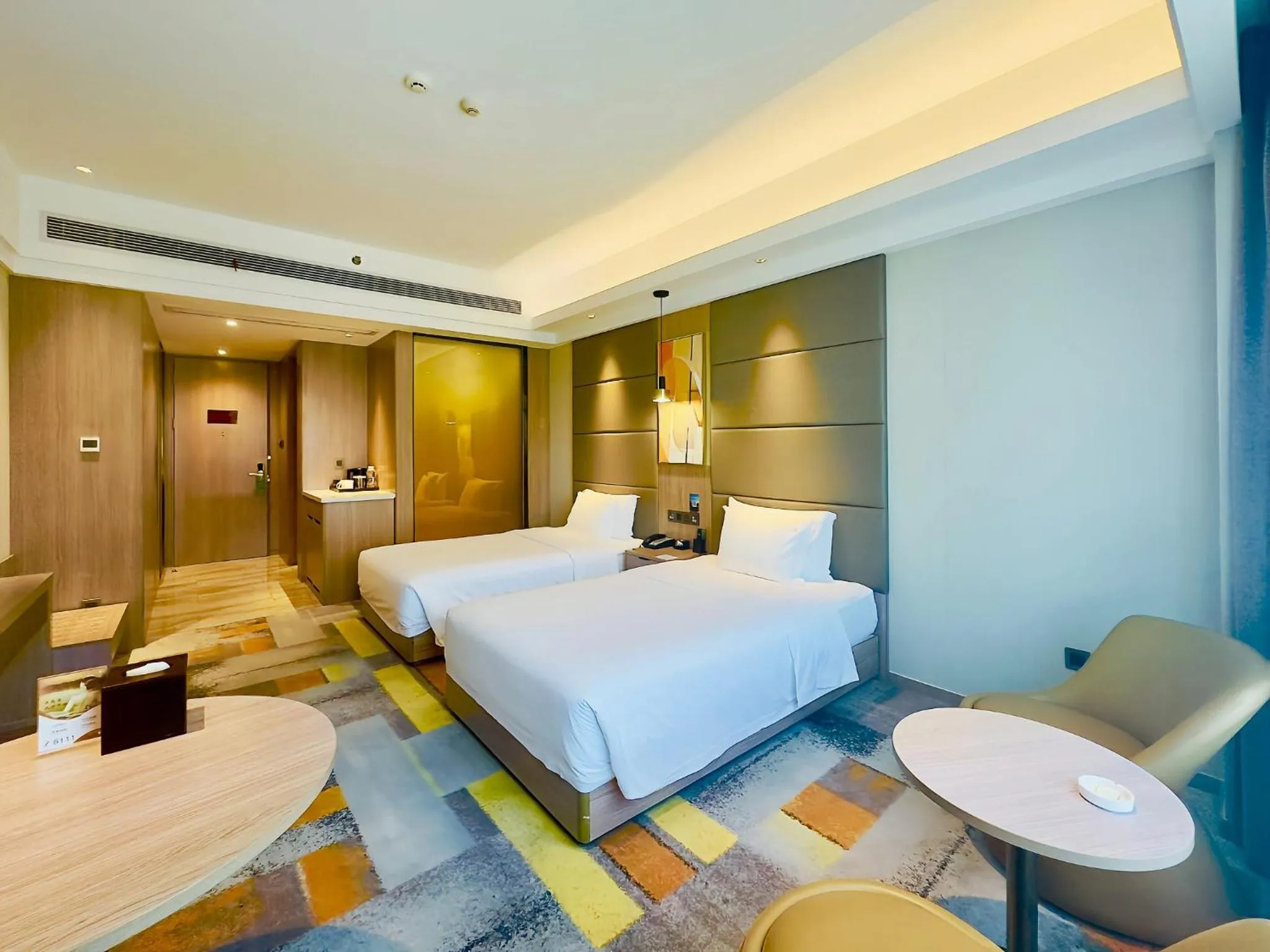 Photo of the whole room, Bed in Holiday Inn Nantong Oasis International by IHG