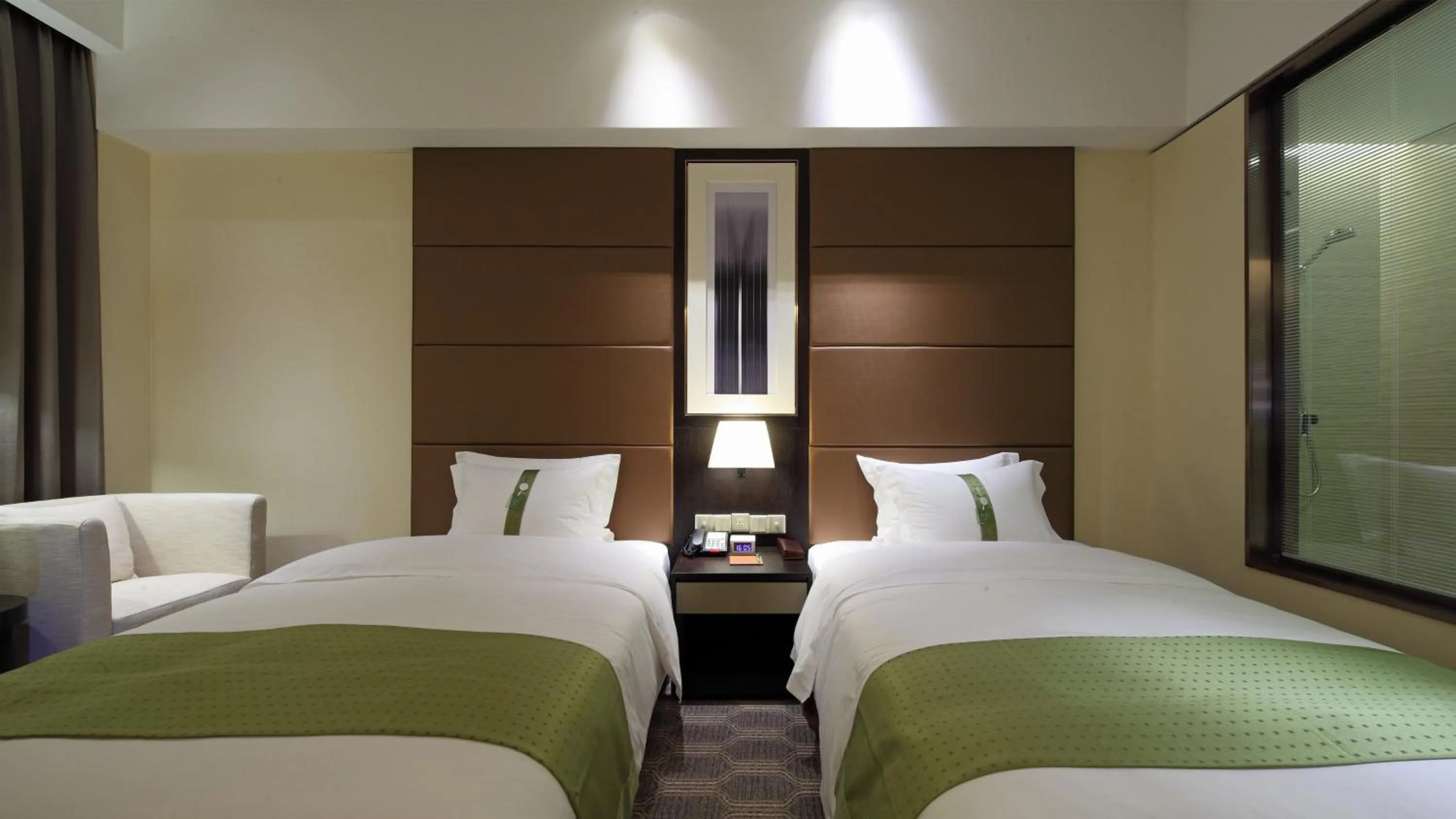 Photo of the whole room, Bed in Holiday Inn Nantong Oasis International by IHG