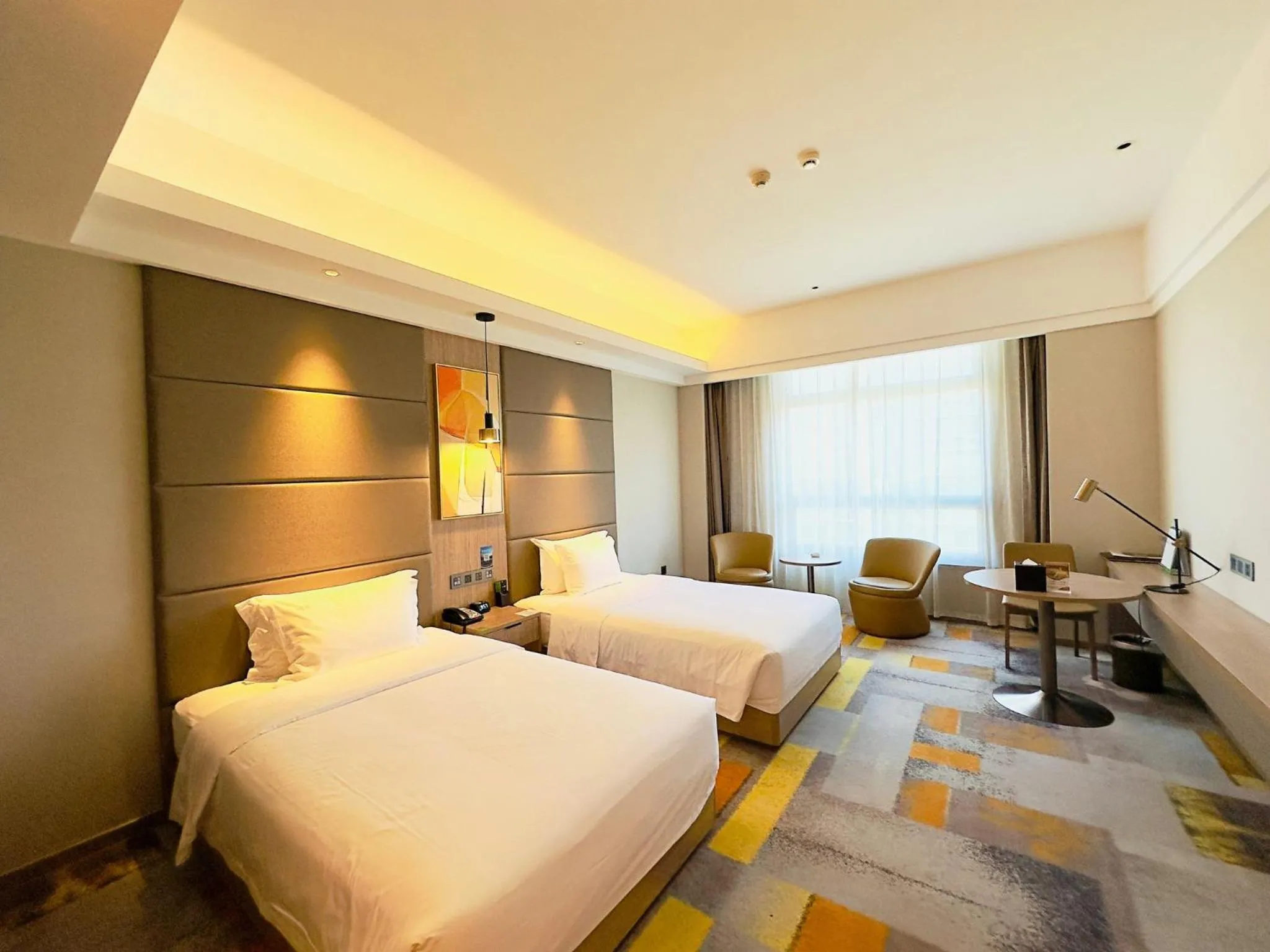 Photo of the whole room, Bed in Holiday Inn Nantong Oasis International by IHG