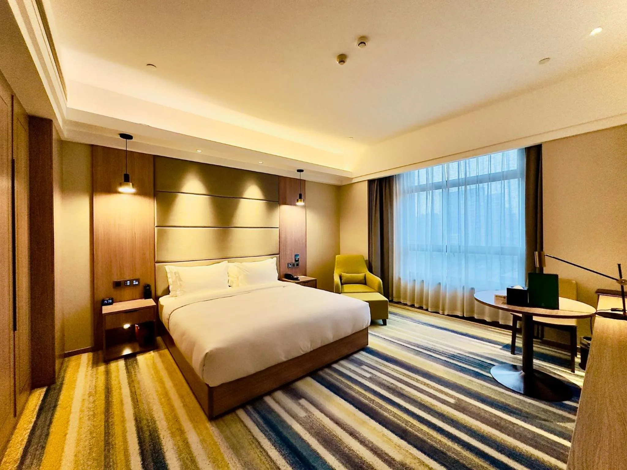 Photo of the whole room, Bed in Holiday Inn Nantong Oasis International by IHG