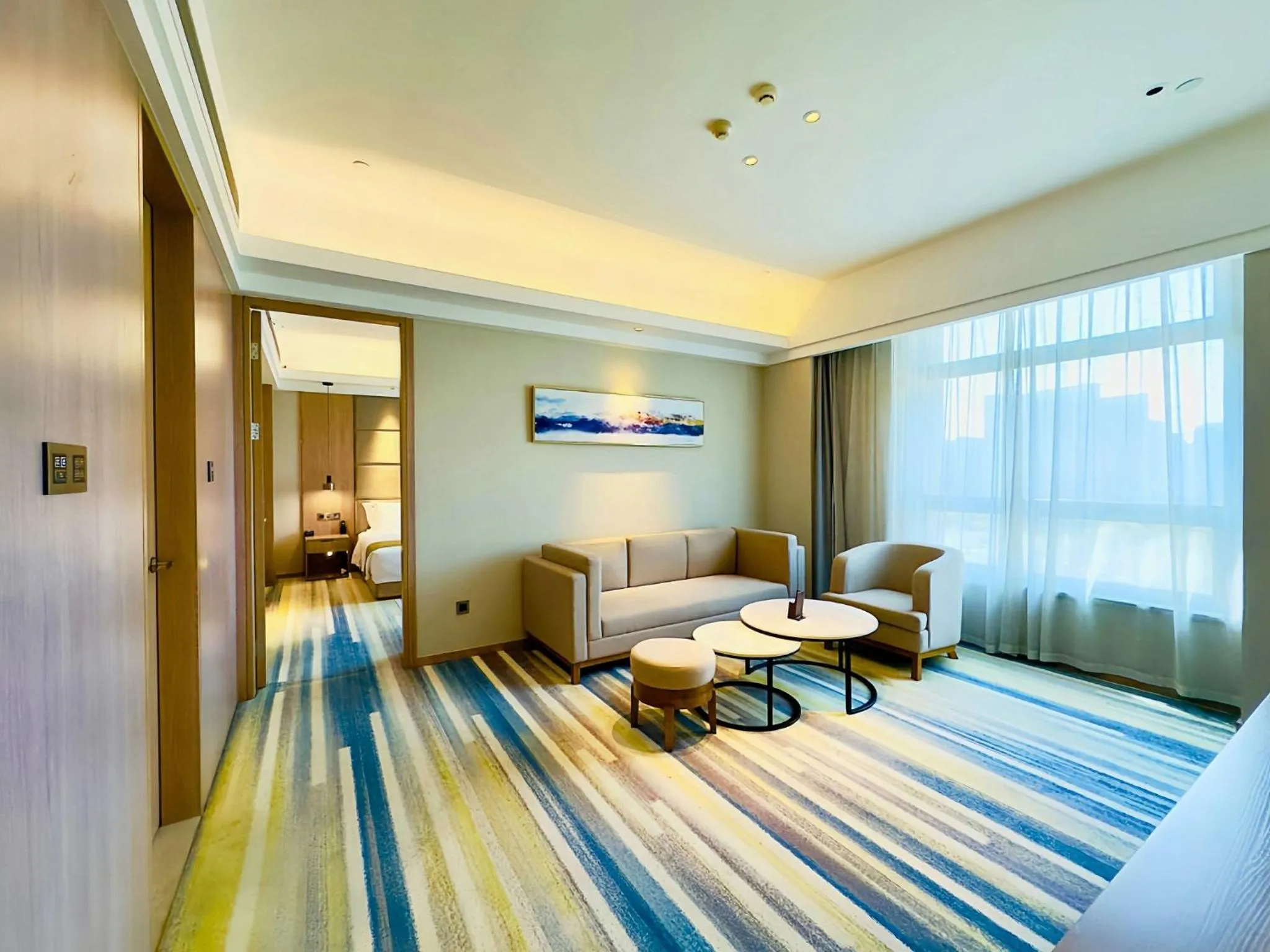 Photo of the whole room, Bed in Holiday Inn Nantong Oasis International by IHG