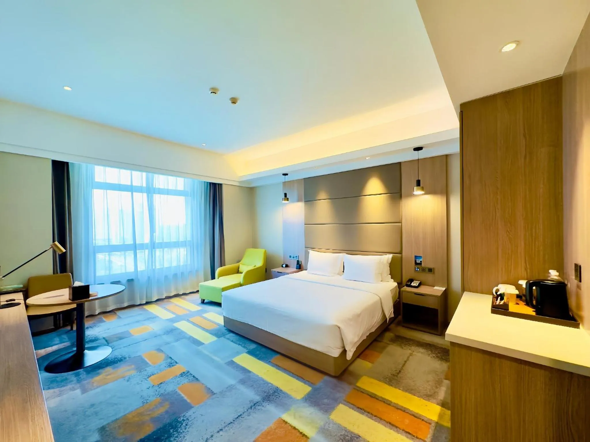 Photo of the whole room, Bed in Holiday Inn Nantong Oasis International by IHG
