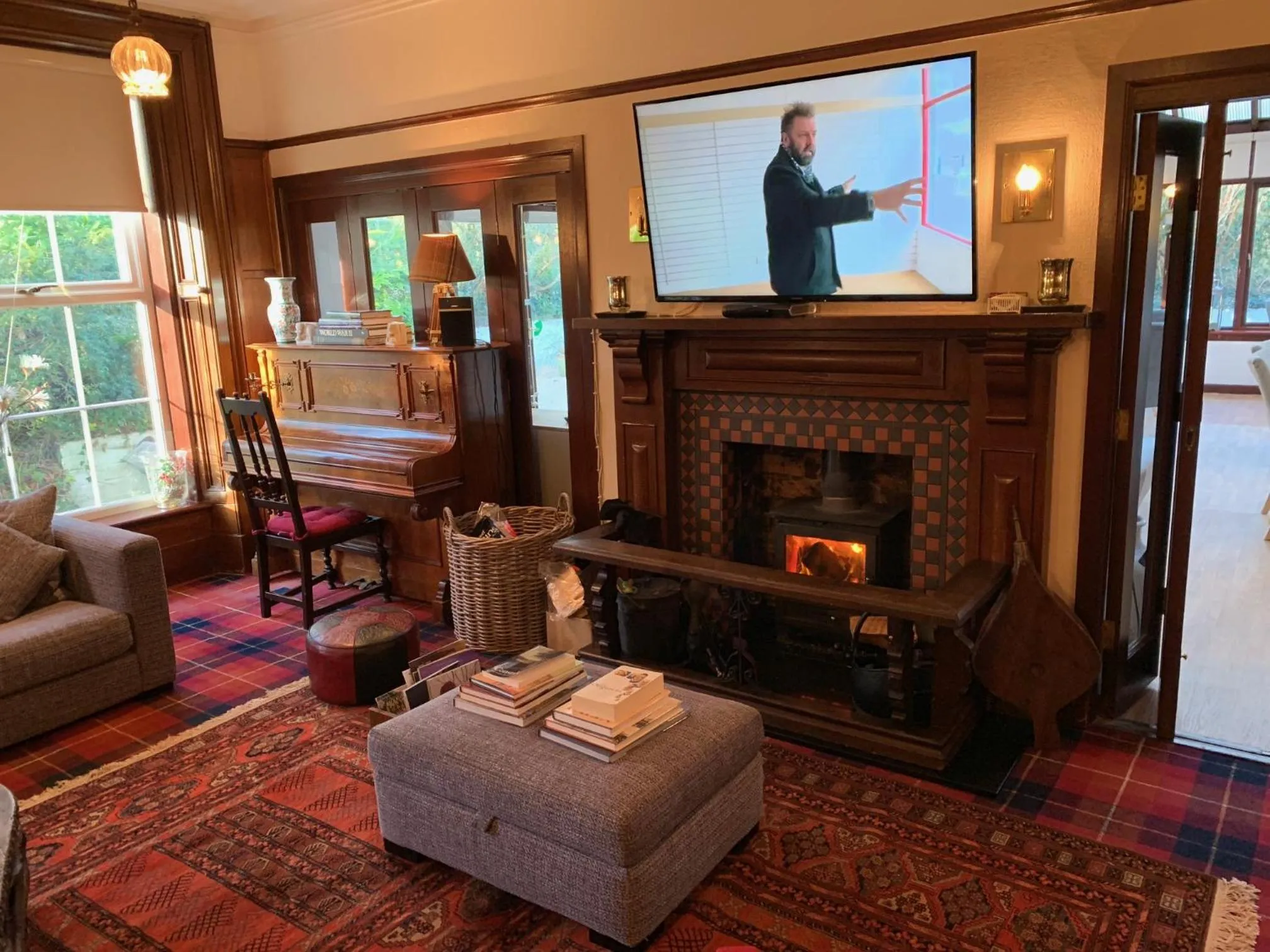 Communal lounge/ TV room in Torrs Warren Country House Hotel