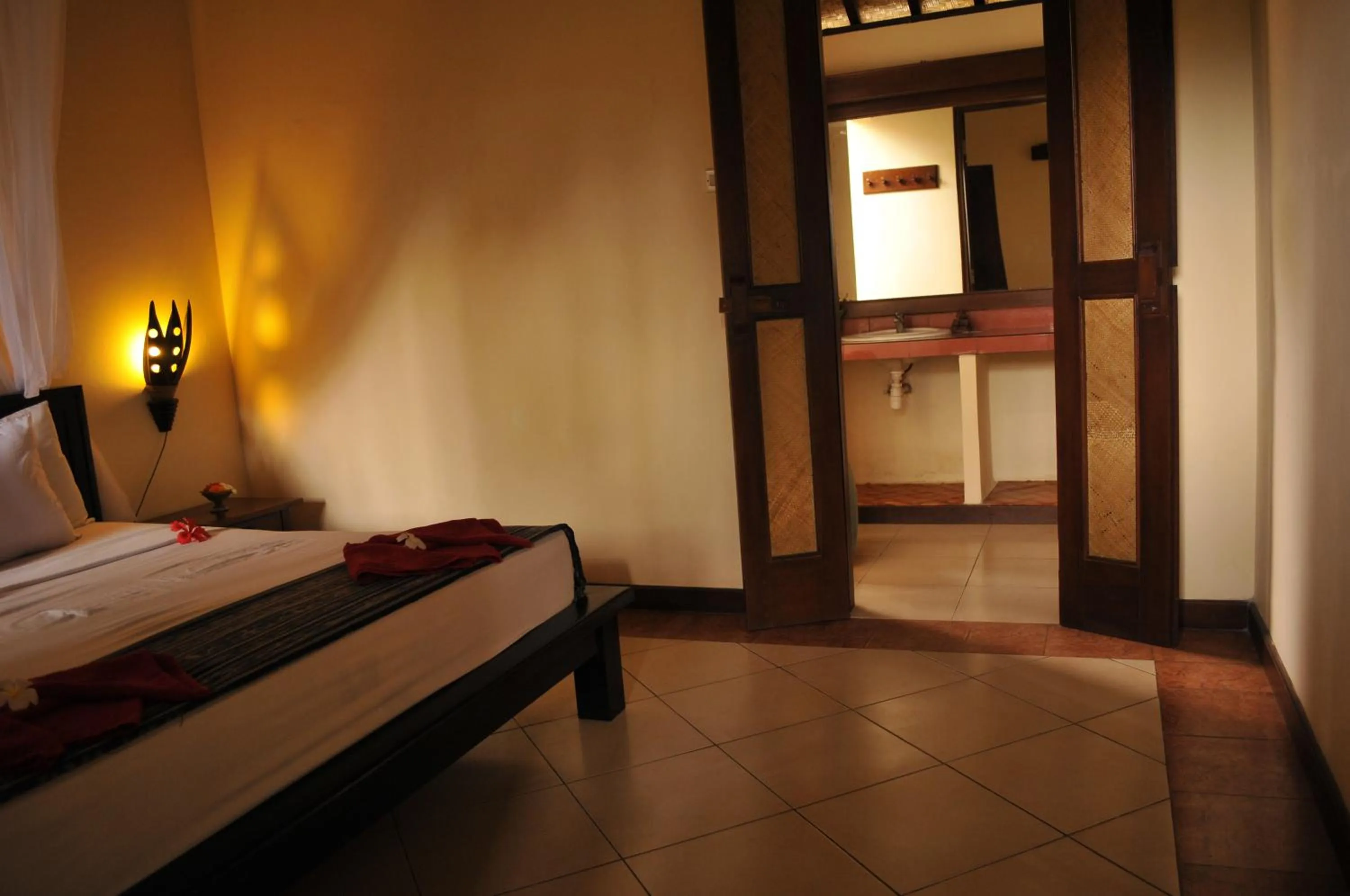 Bathroom, Bed in Tirta Sari Bungalow