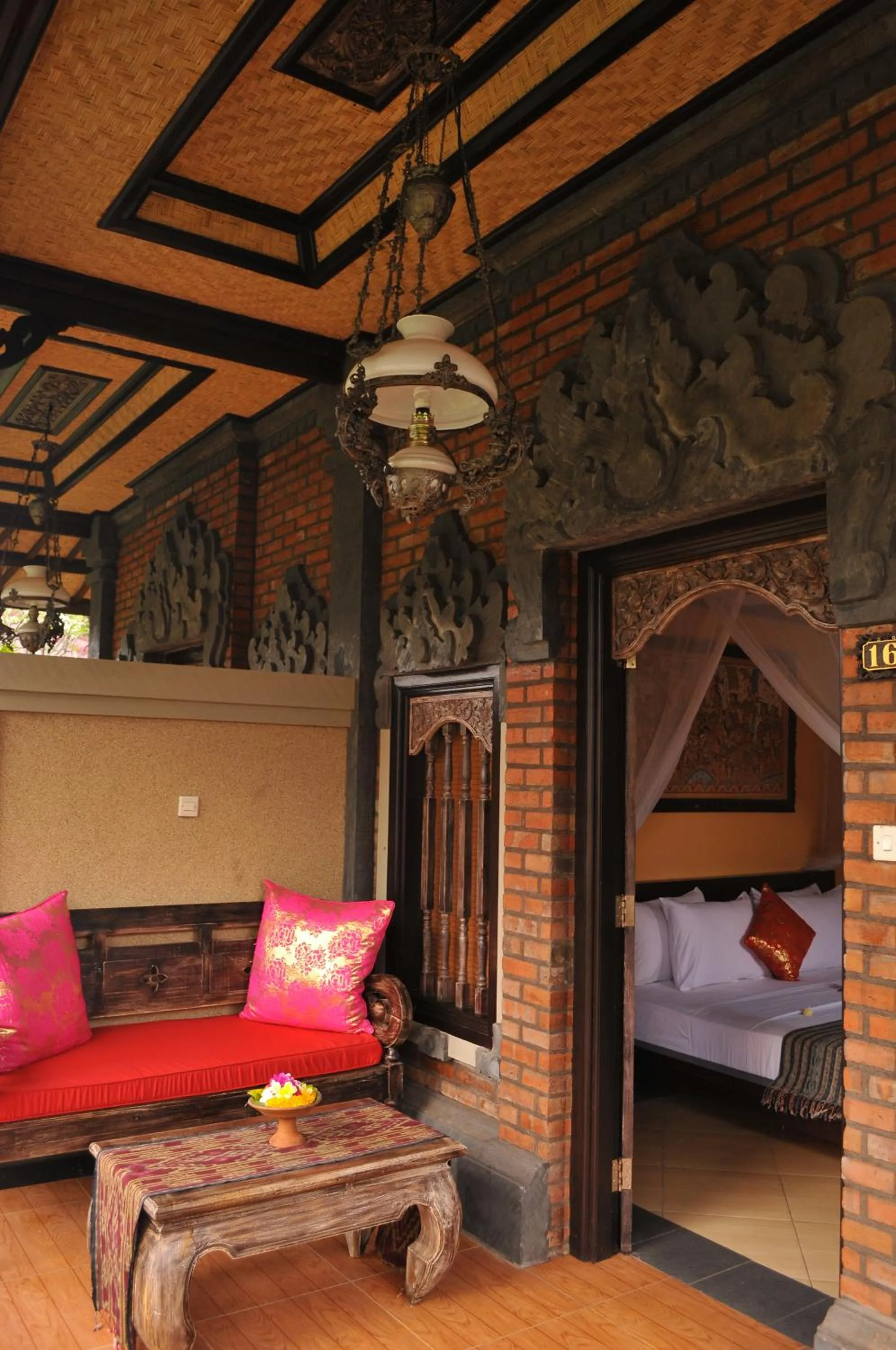 Balcony/Terrace, Bed in Tirta Sari Bungalow