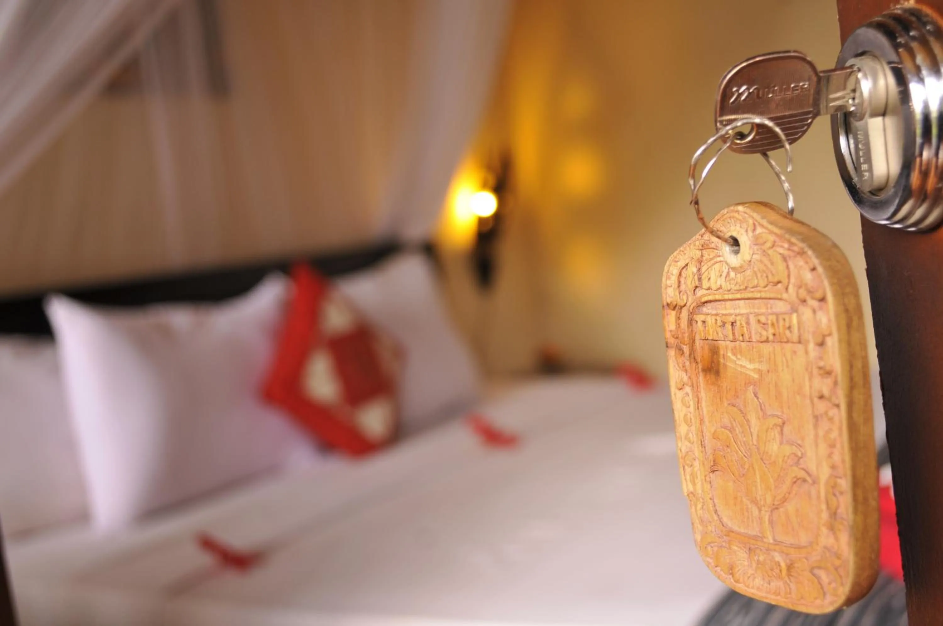 Bed in Tirta Sari Bungalow