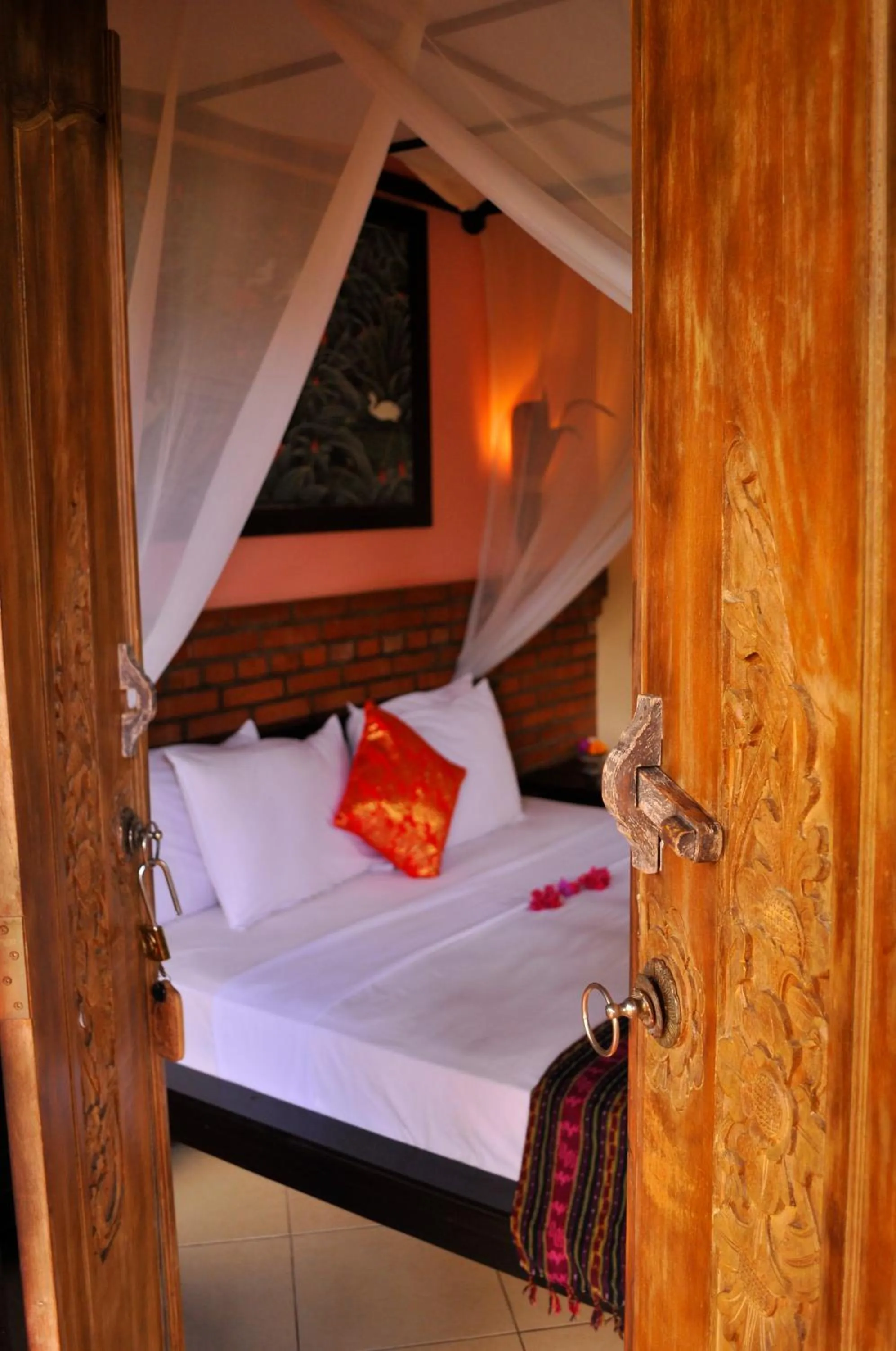 Balcony/Terrace, Bed in Tirta Sari Bungalow