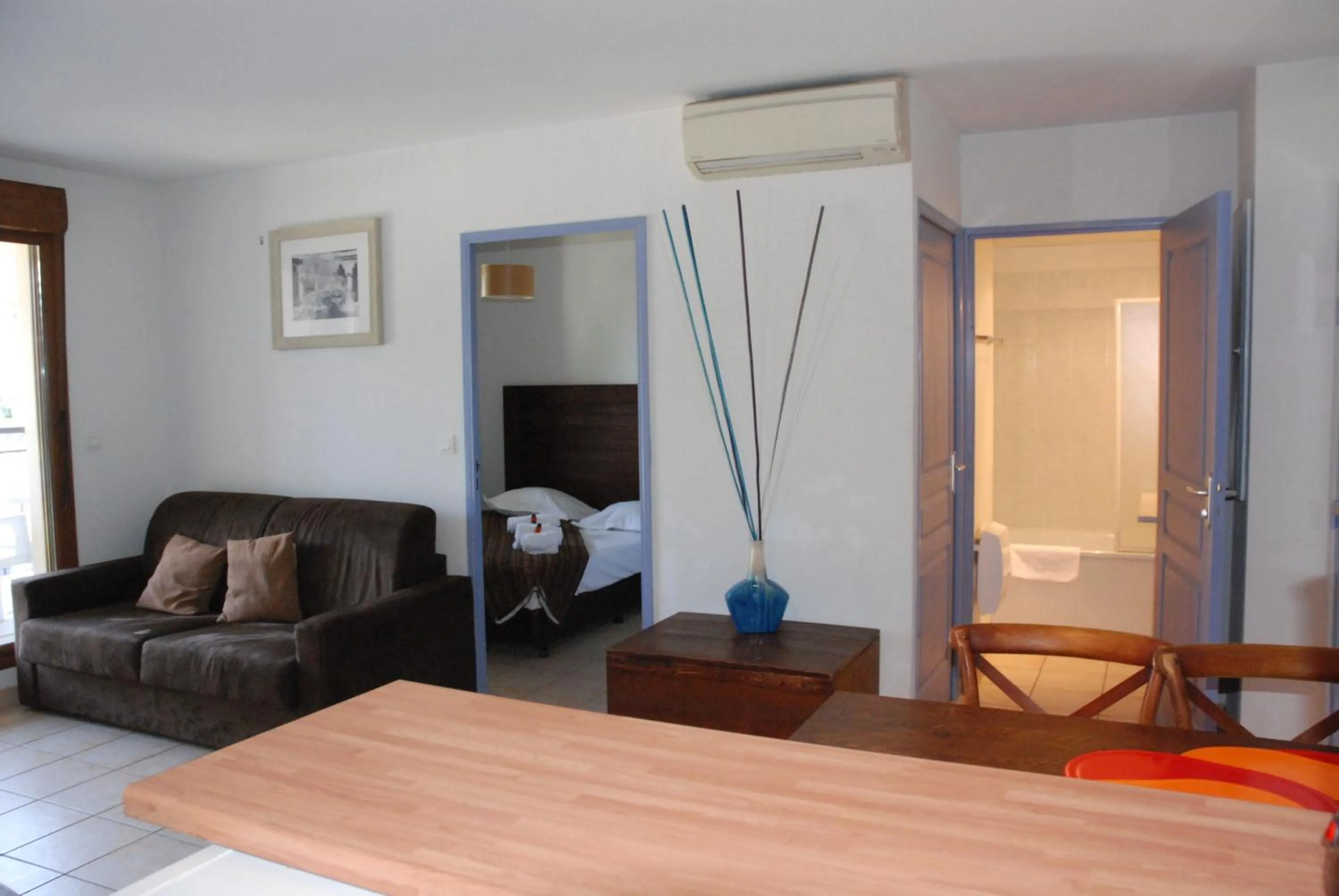 Living room in UZES APPART HOTEL Résidence Le Mas des Oliviers