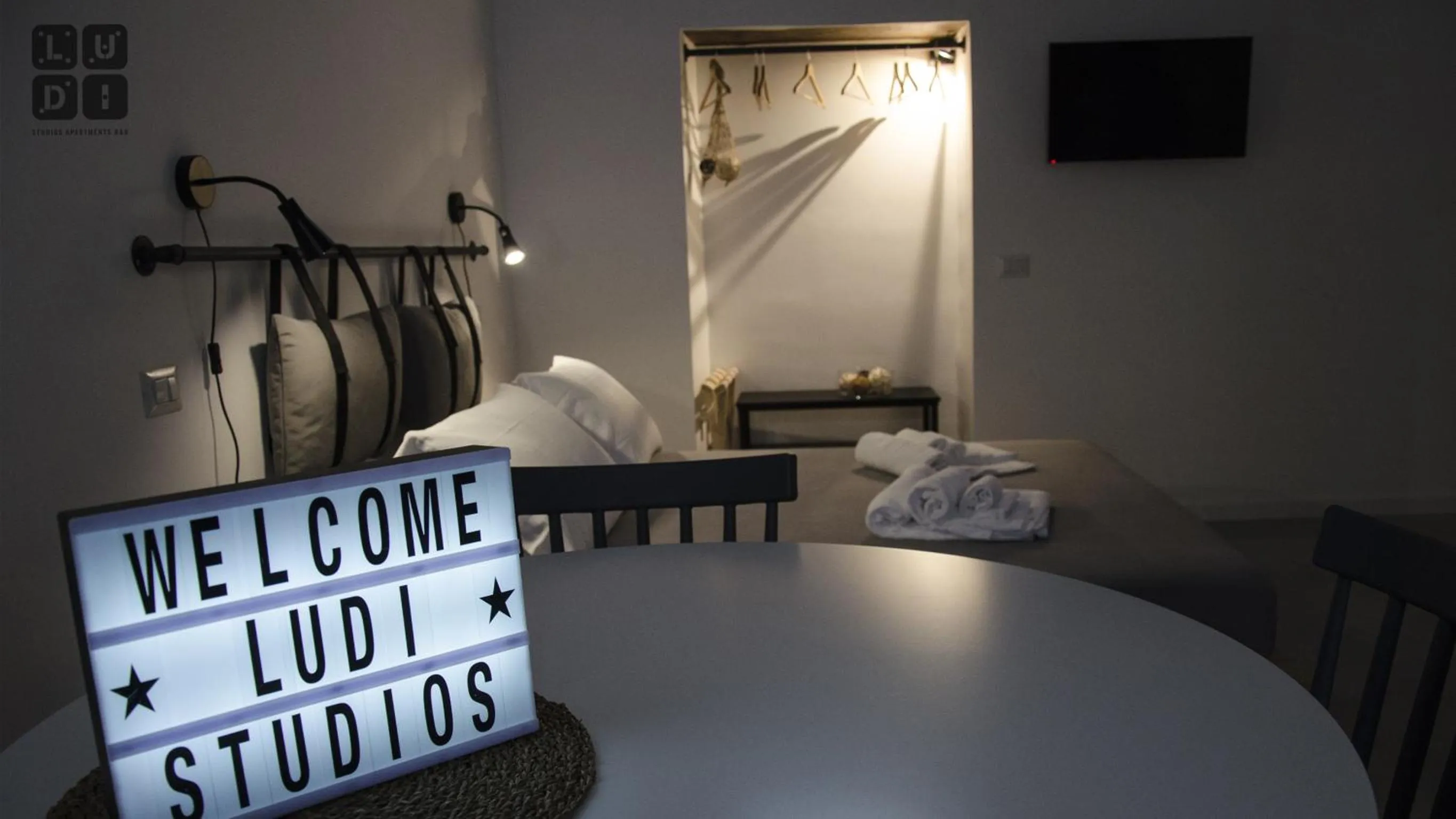 Property logo or sign, Bed in Ludi Studios