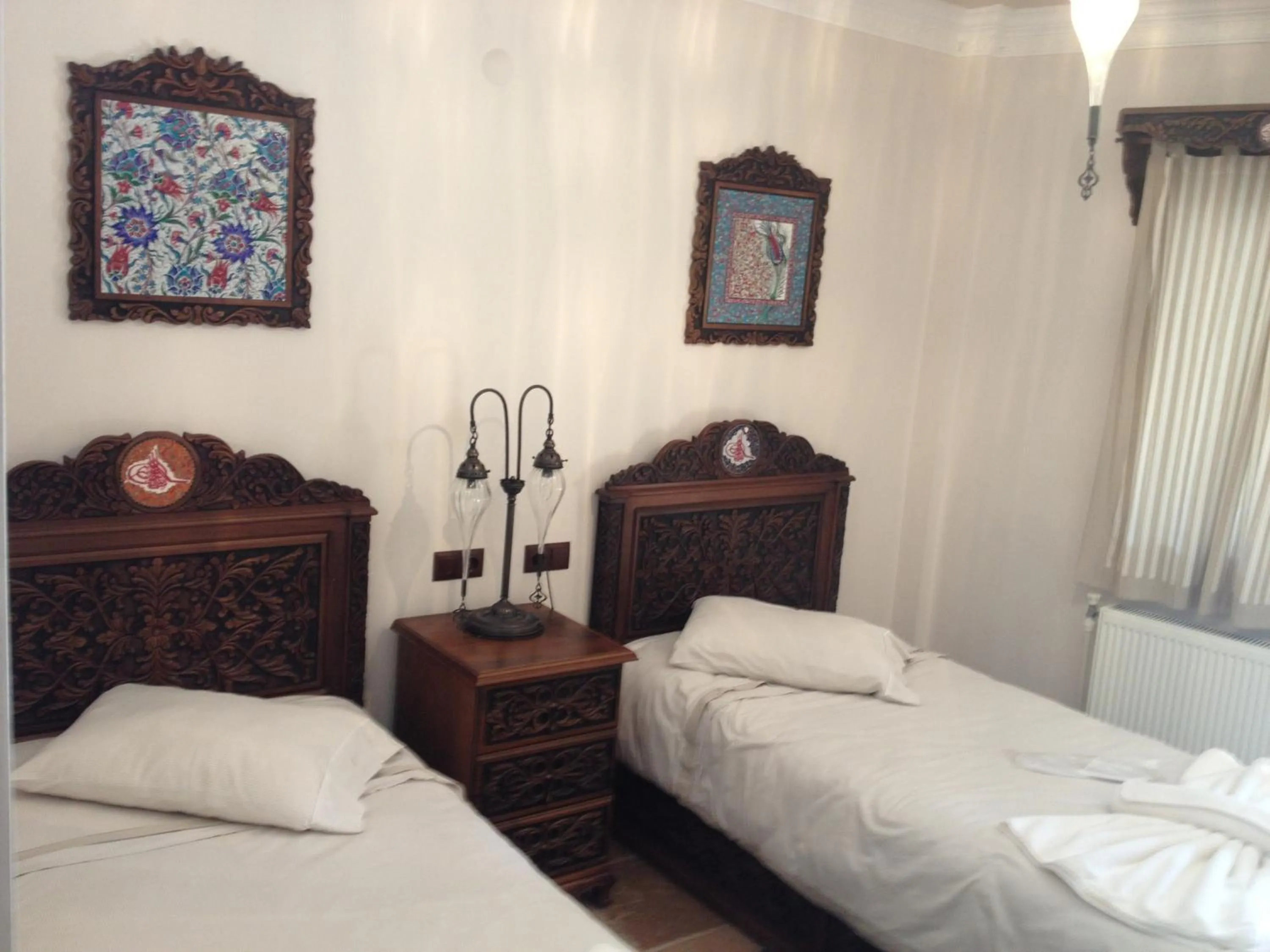 Photo of the whole room, Bed in Nilya Hotel