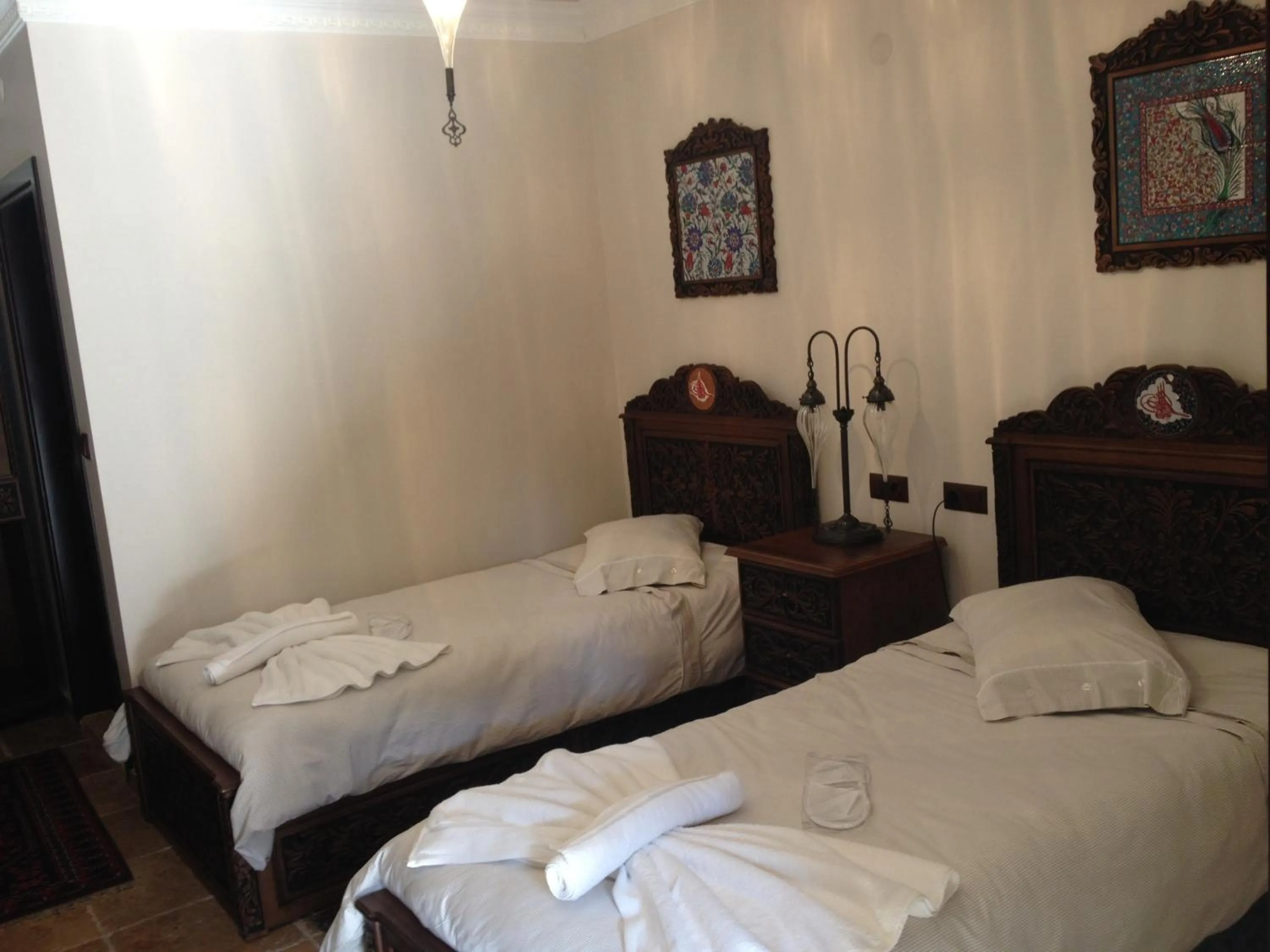 Photo of the whole room, Bed in Nilya Hotel