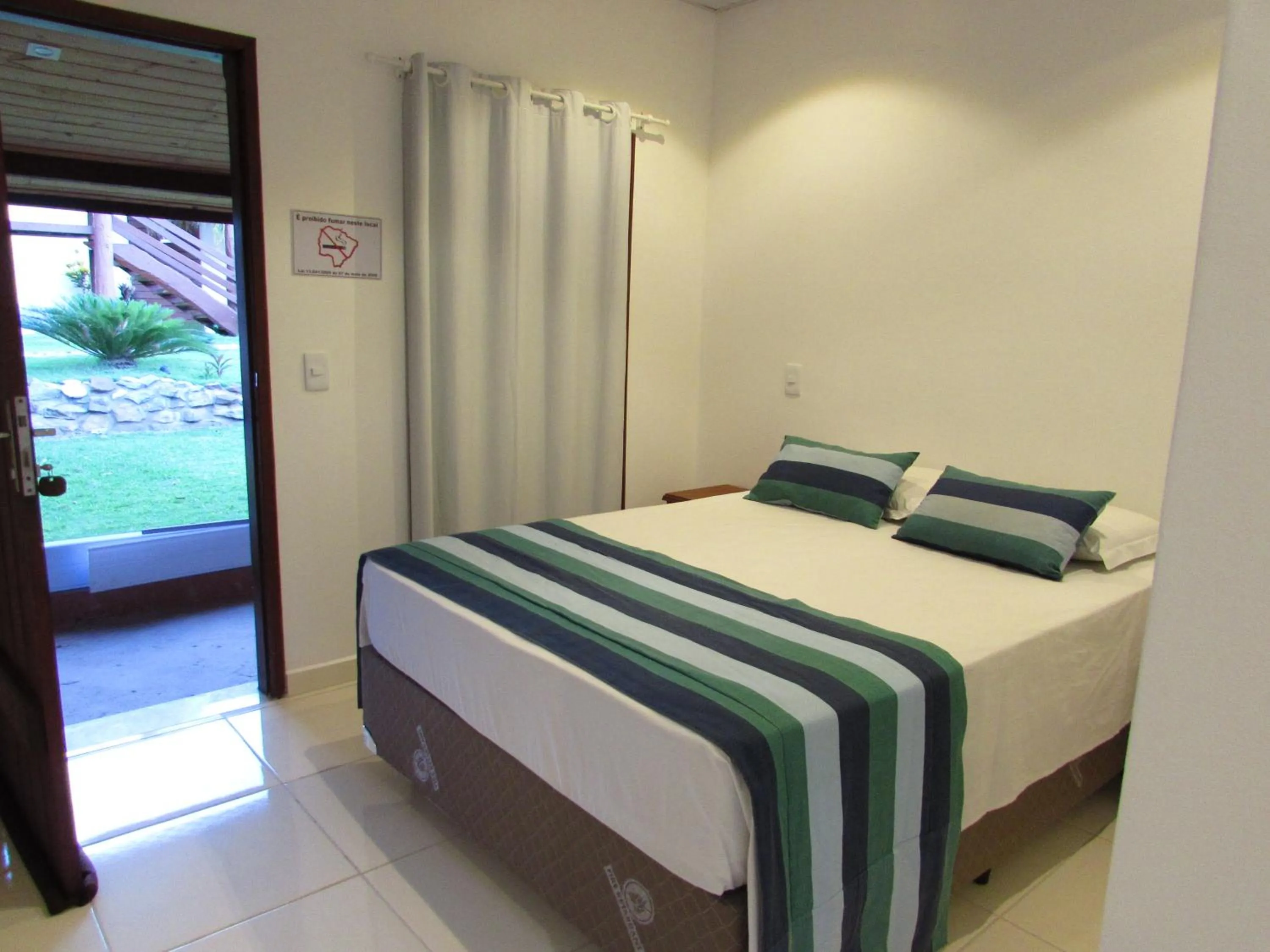 Bed in Pousada Muito Bonito