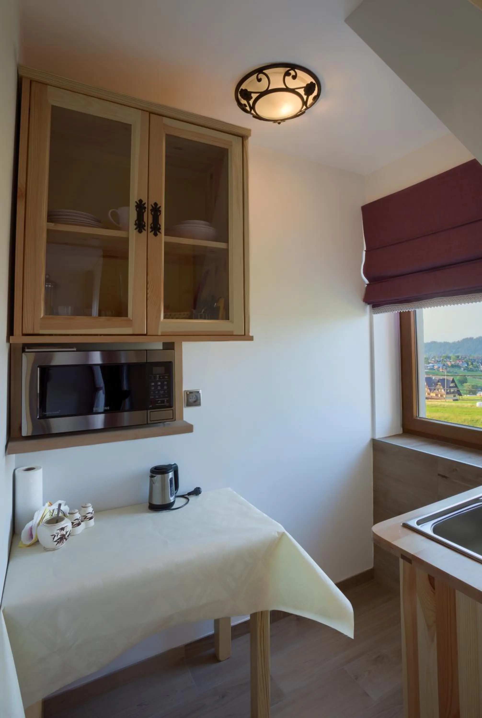 Kitchen or kitchenette in ECO Willa Grand Karpatia Ski&Wellness