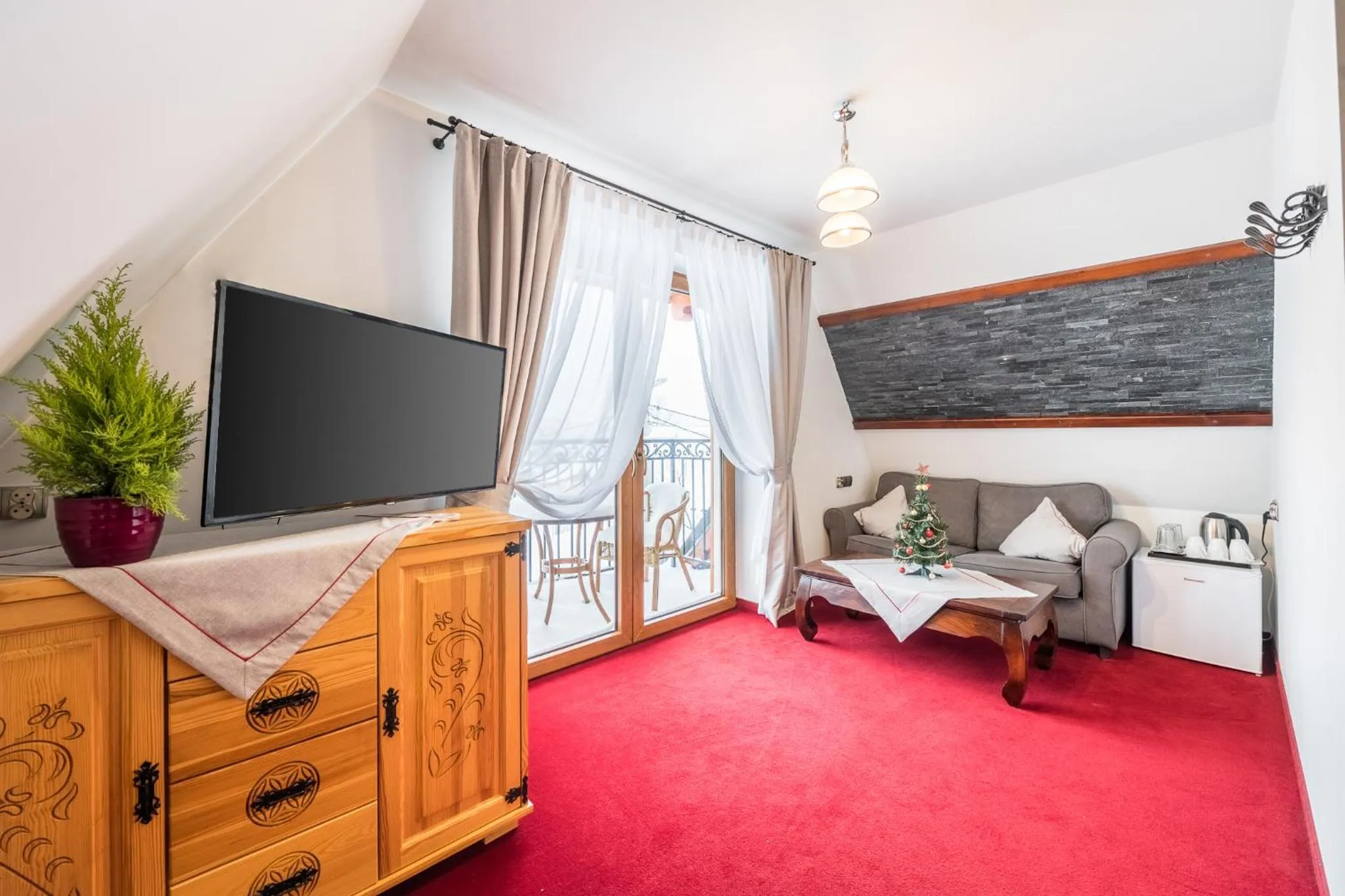 Living room, Bed in ECO Willa Grand Karpatia Ski&Wellness