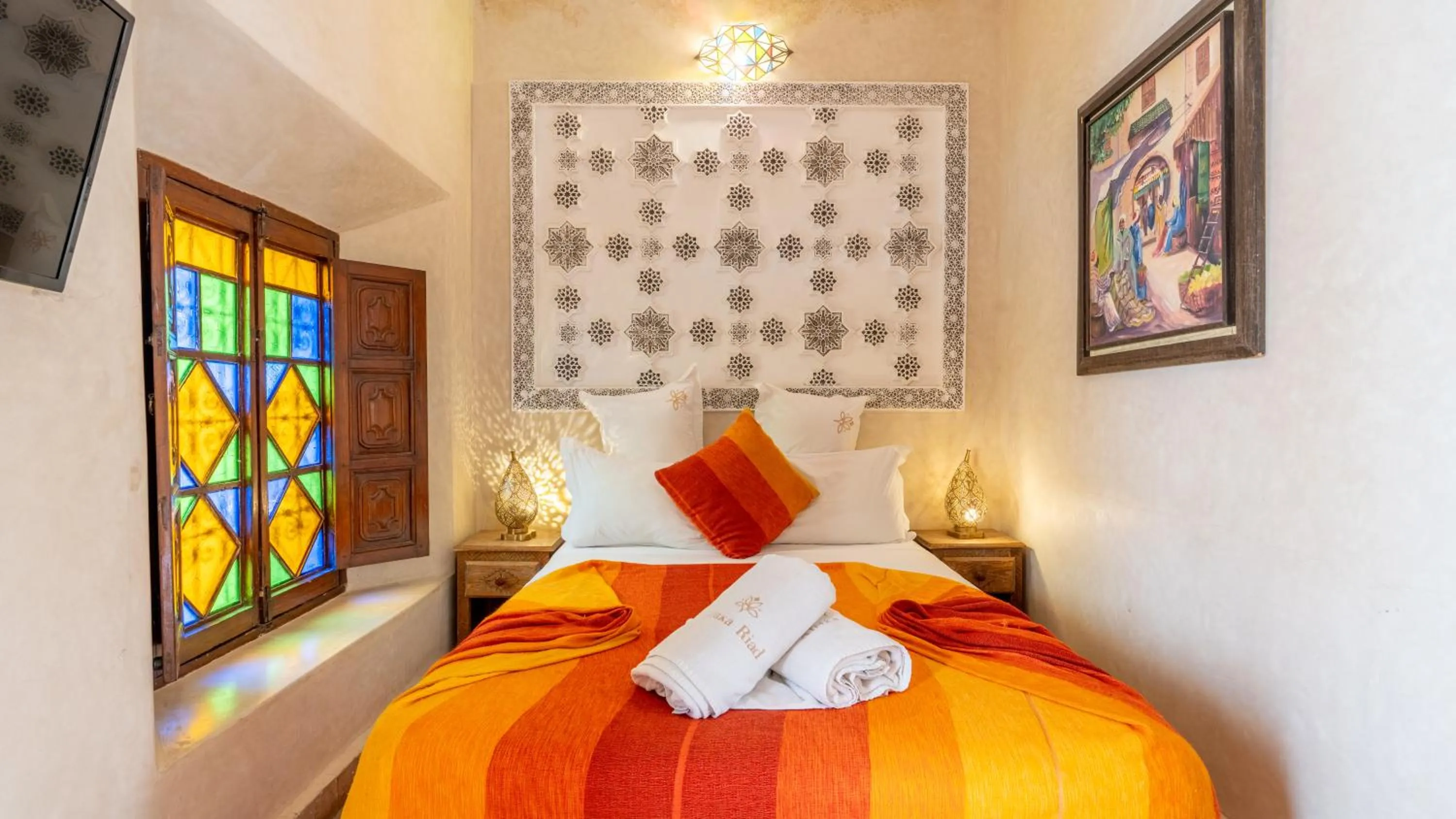 TV and multimedia, Bed in Riad Abaka hotel & boutique