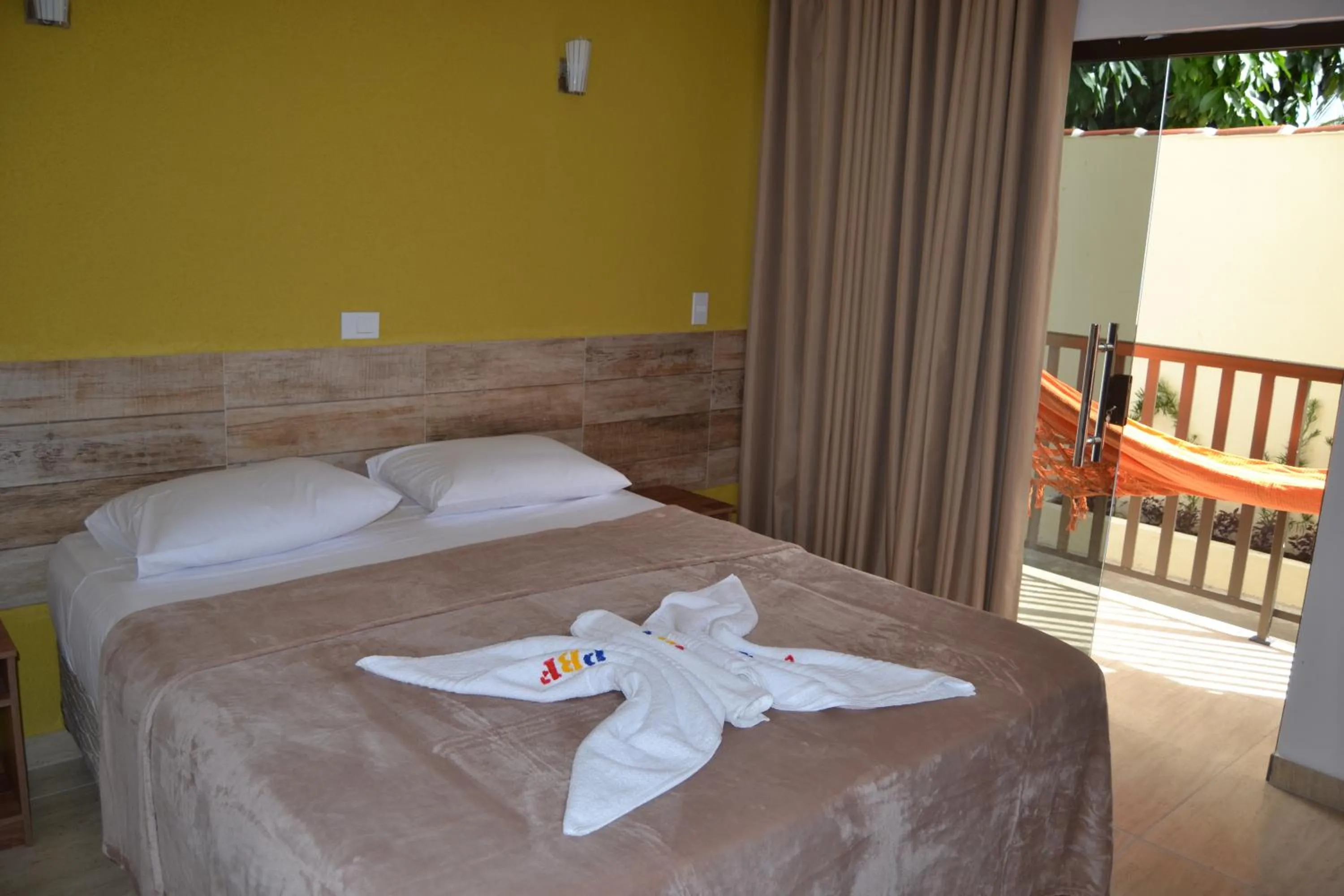 Bed in Pousada Beija Flores