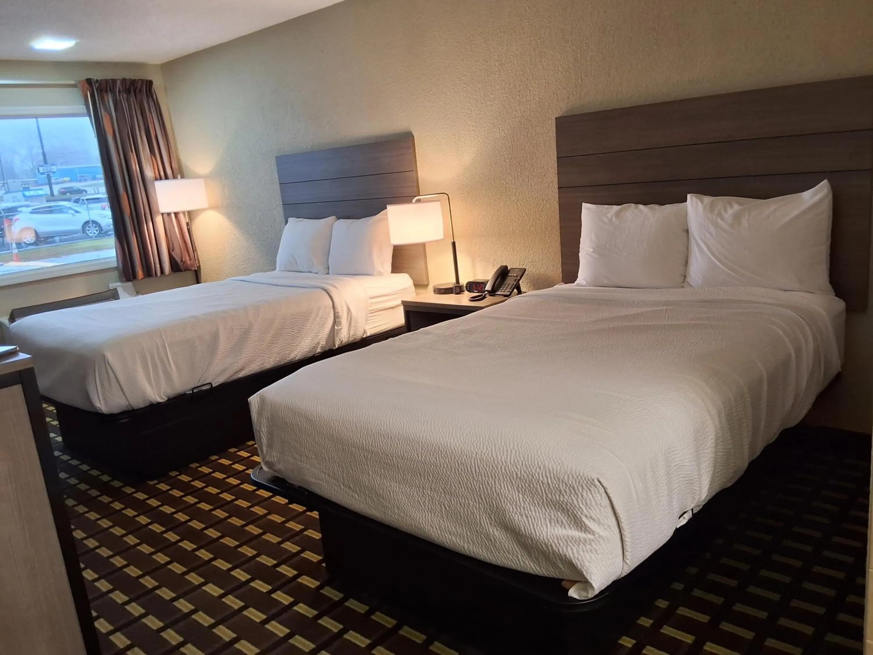 Bed in Travelodge by Wyndham-Thomasville AL