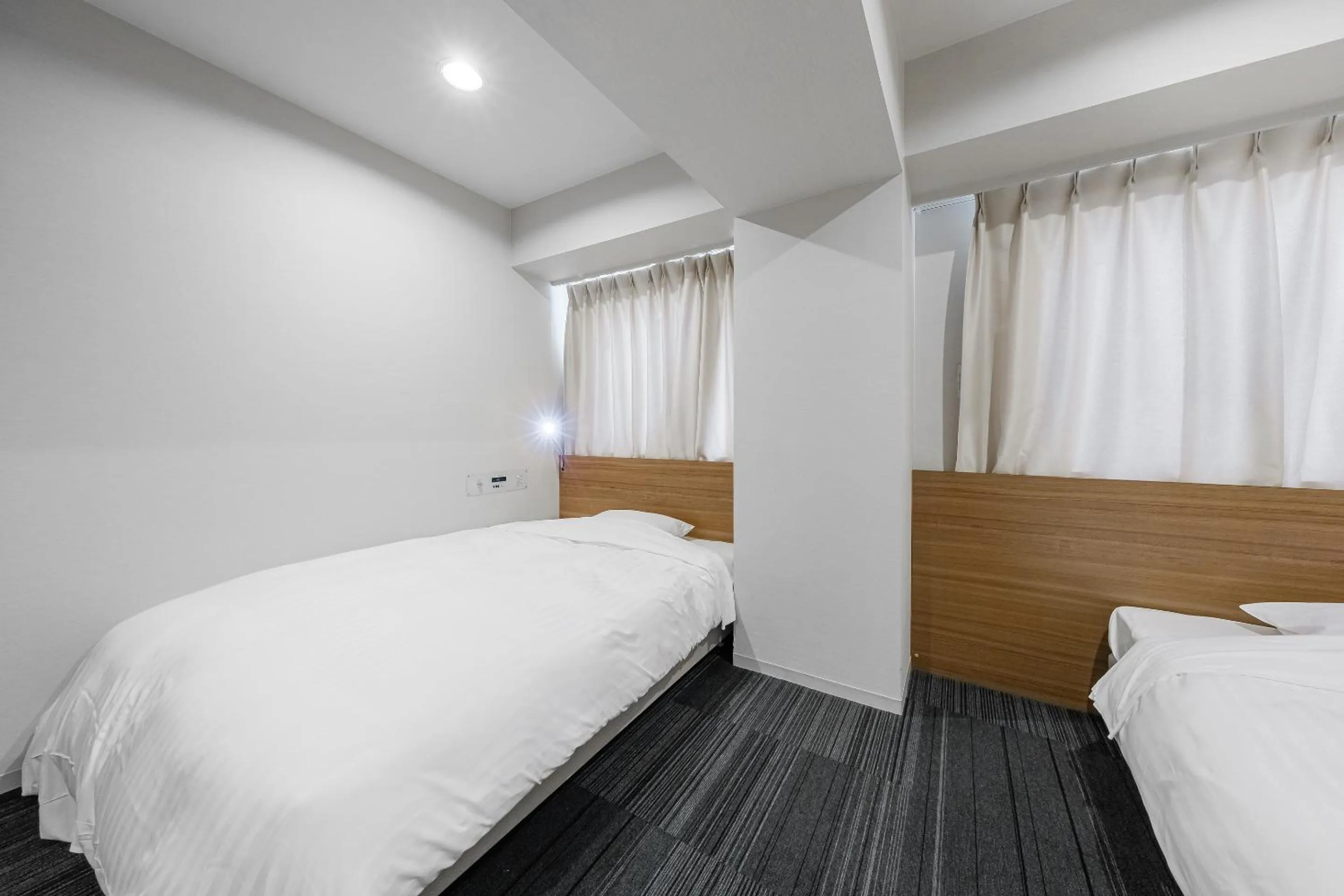 Bed in Tabist Annex Hotel Tetora Hakodate