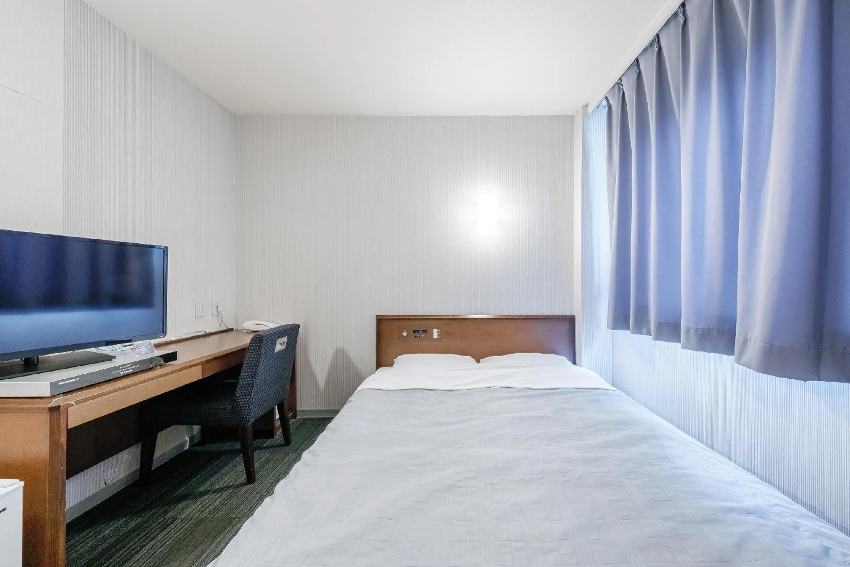 Bed in Tabist Annex Hotel Tetora Hakodate