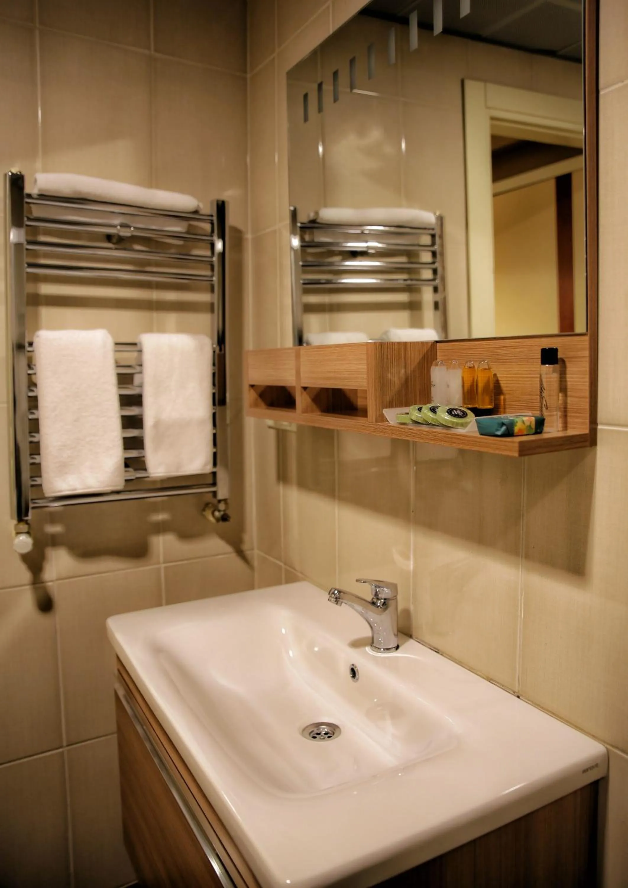 Toilet in Akin Suites