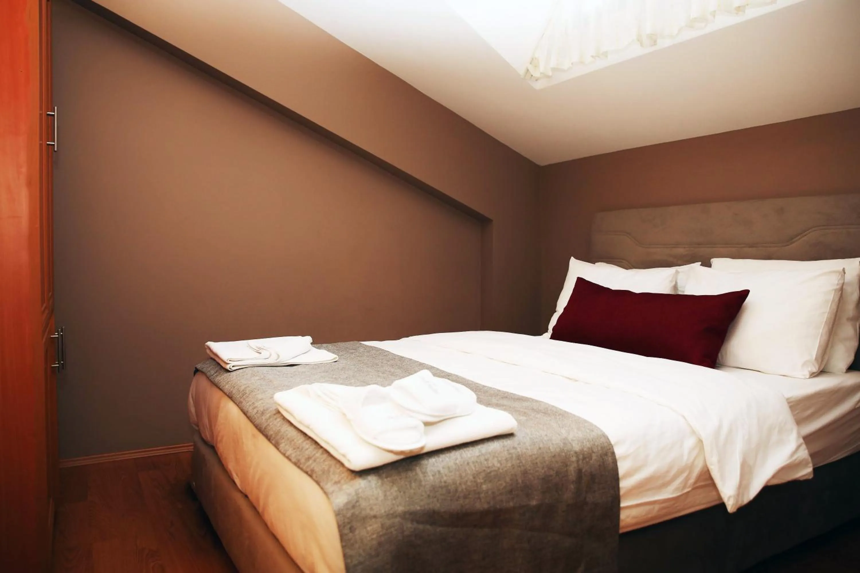 Bedroom in Akin Suites