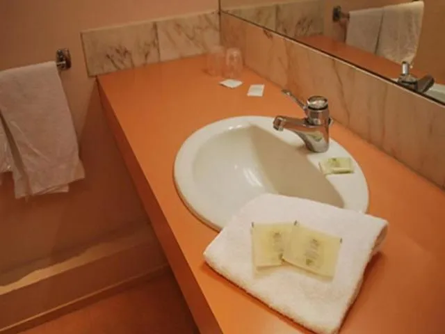 Bathroom in Logis Hôtel & Restaurant - Le Normandie