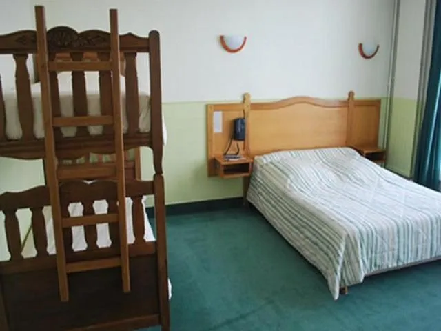 Photo of the whole room in Logis Hôtel & Restaurant - Le Normandie