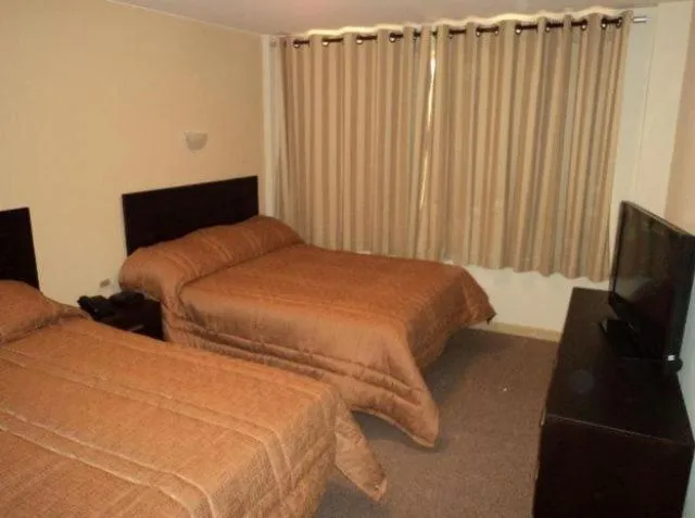 Bed in Los Sauces Apart Hotel