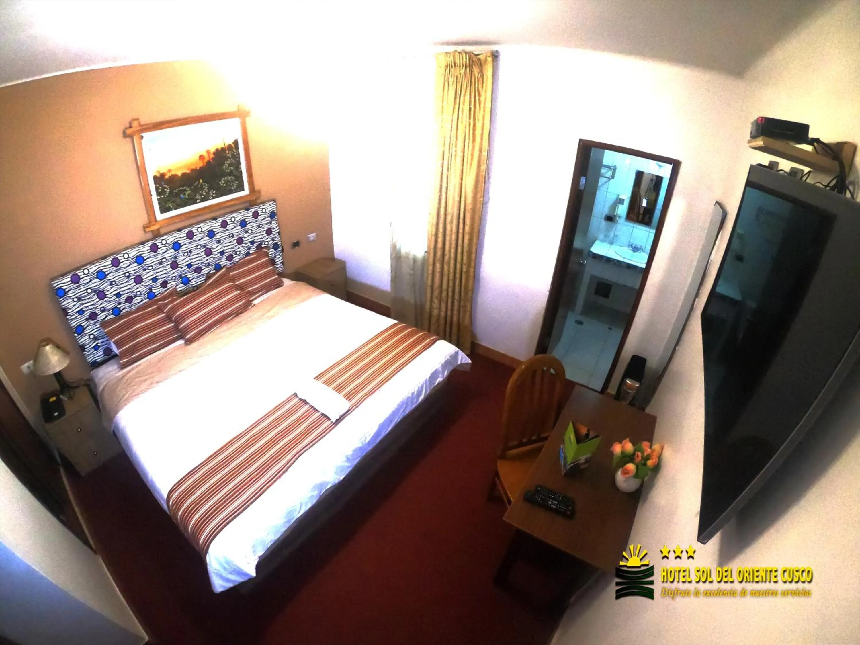 Bed in Hotel Sol del Oriente Cusco