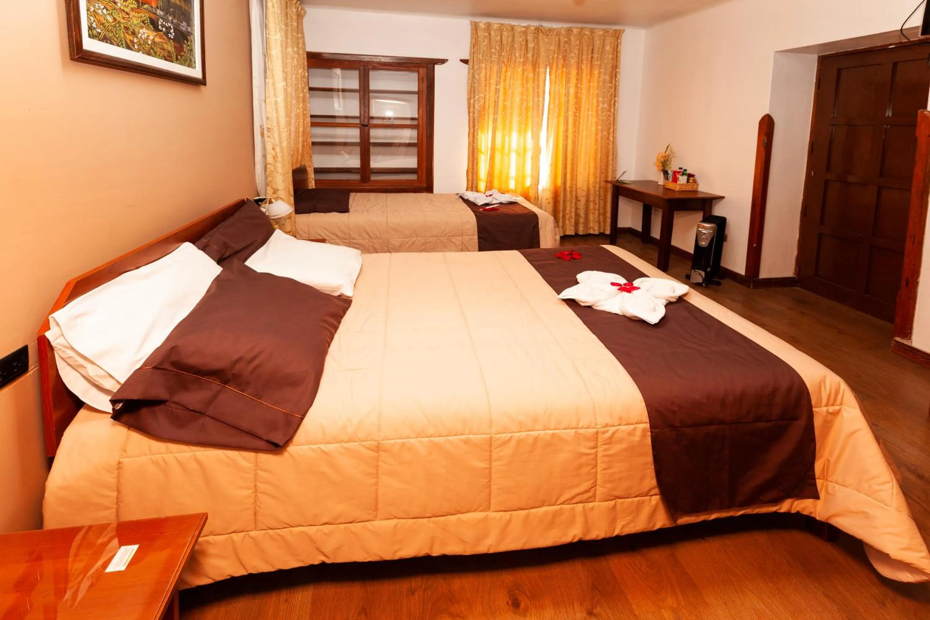 Bed in Hotel Sol del Oriente Cusco