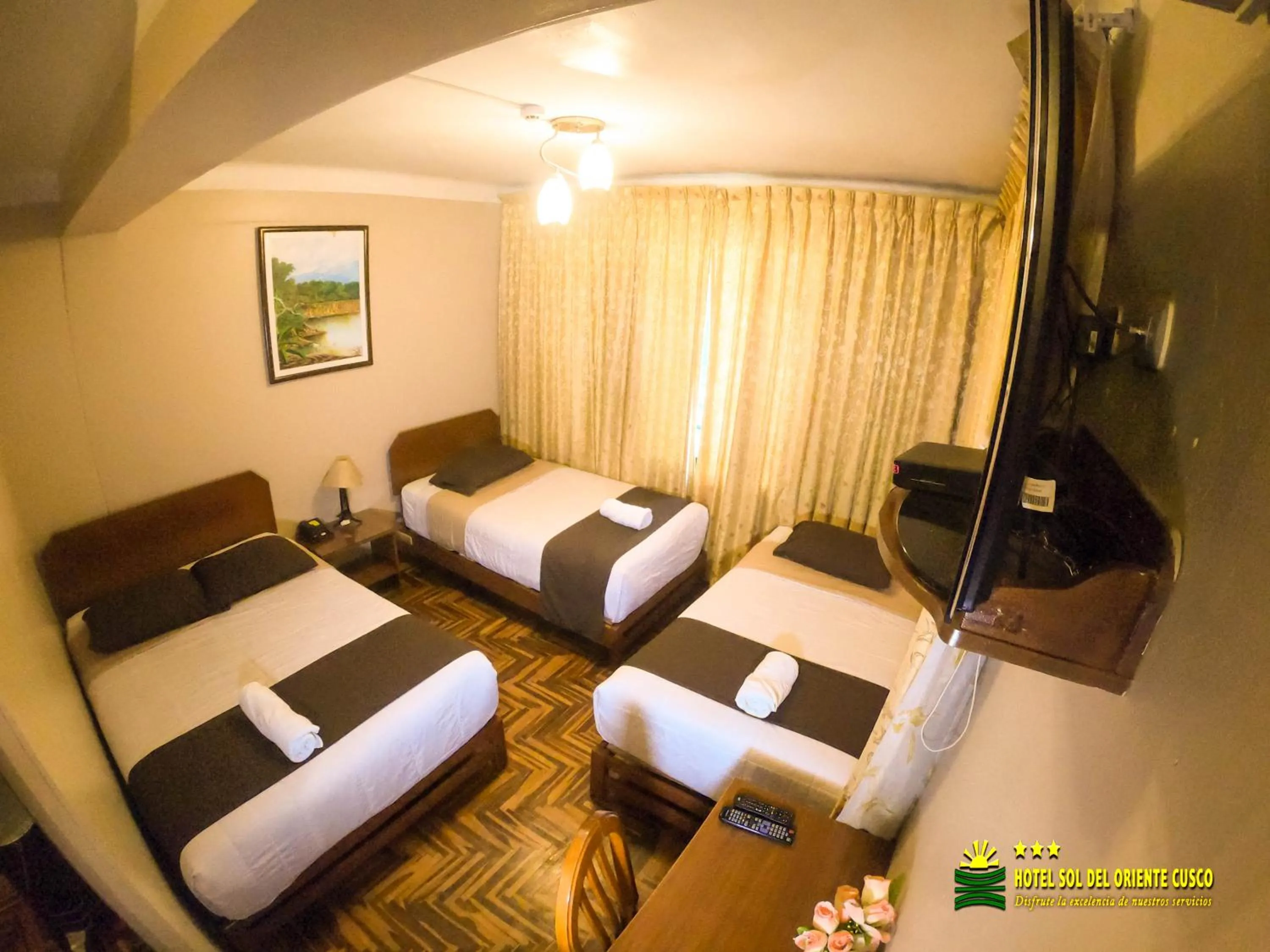 Bed in Hotel Sol del Oriente Cusco