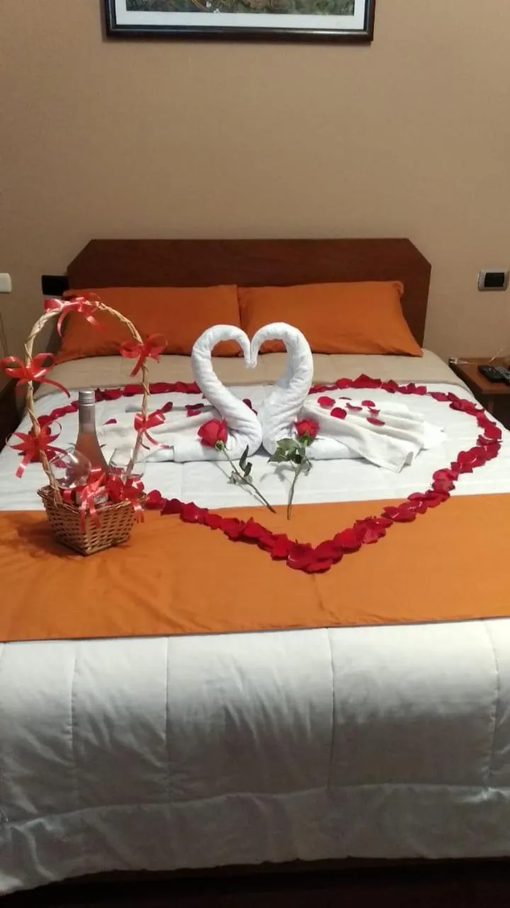 Bed in Hotel Sol del Oriente Cusco