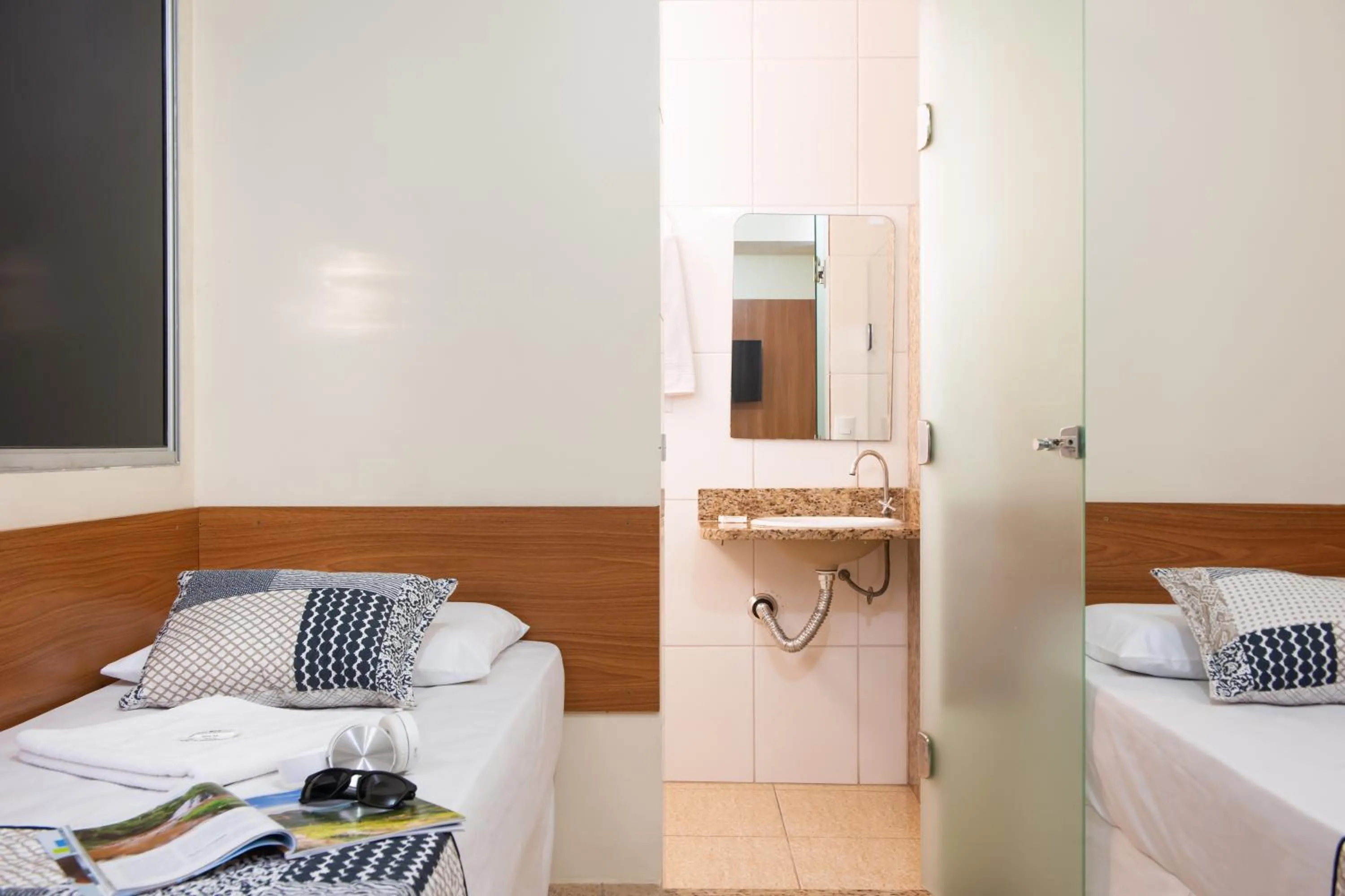 Bed in Hotel Pouso Alegre