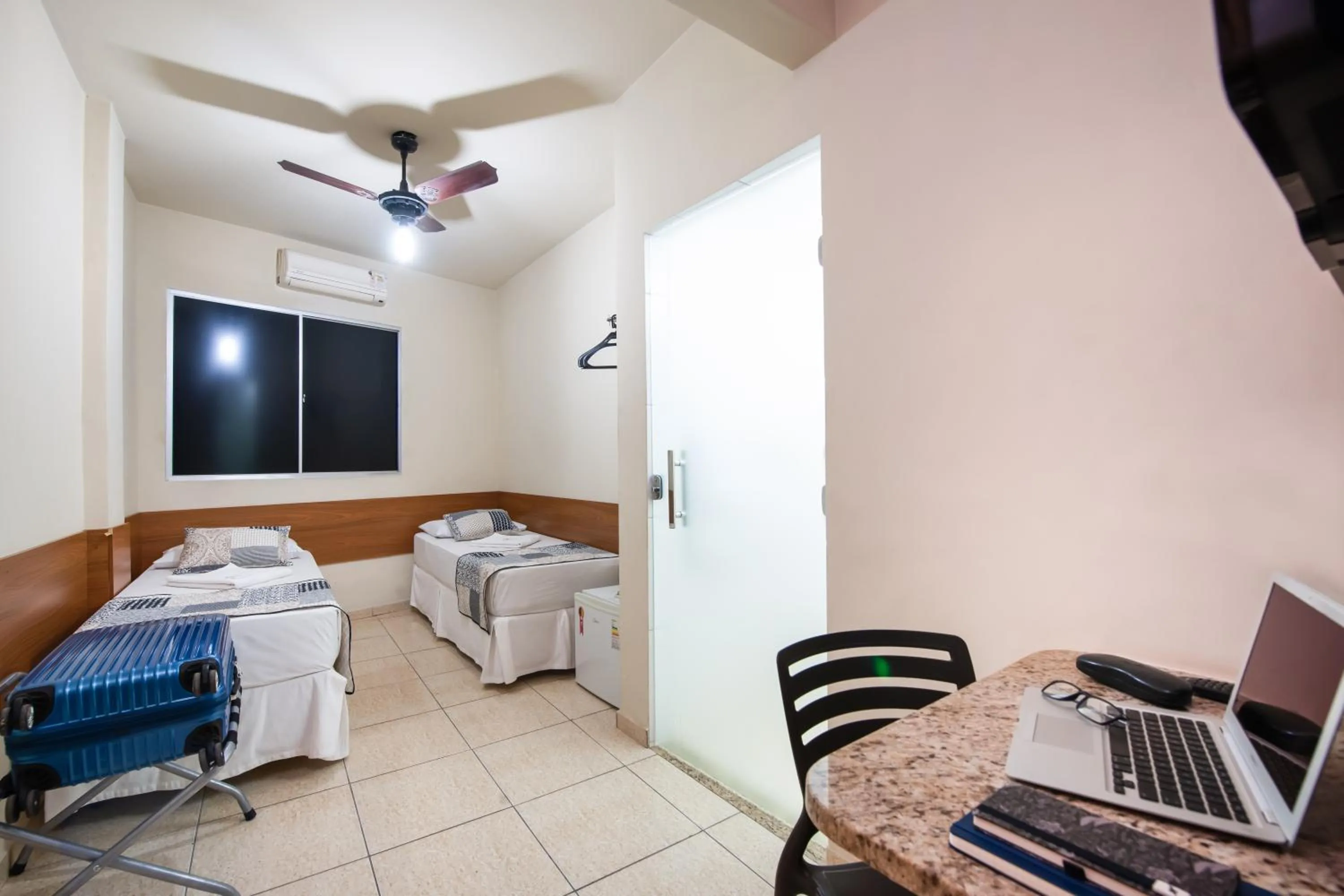 Bed in Hotel Pouso Alegre