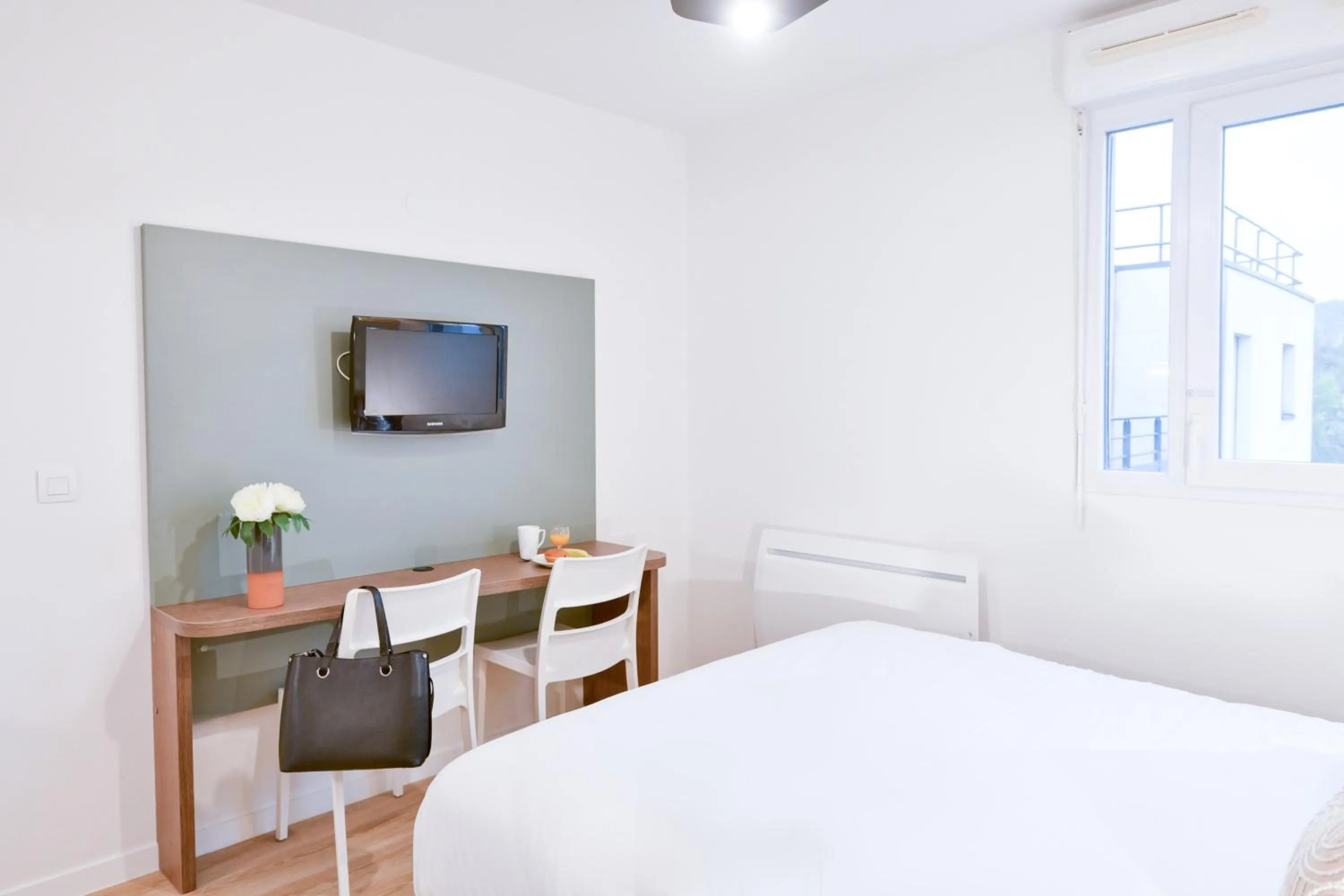 Seating area, Bed in Comfort Aparthotel Versailles, St Cyr l'Ecole